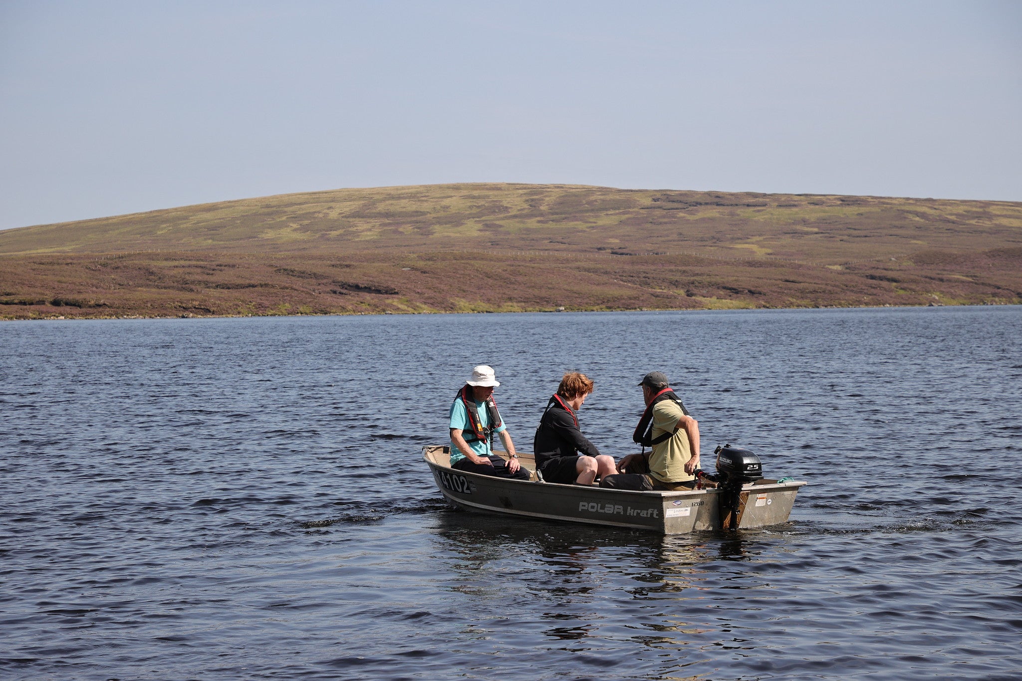 To carry out the survey, a small boat was used to set nets on the loch