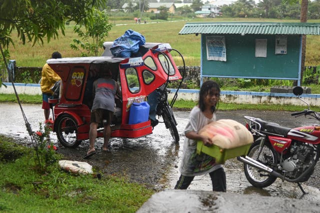 <p>People take shelter at a school as they evacuate in Balangkayan in Eastern Samar on November 3, 2025, ahead of the landfall of Typhoon Kalmaegi.</p>
