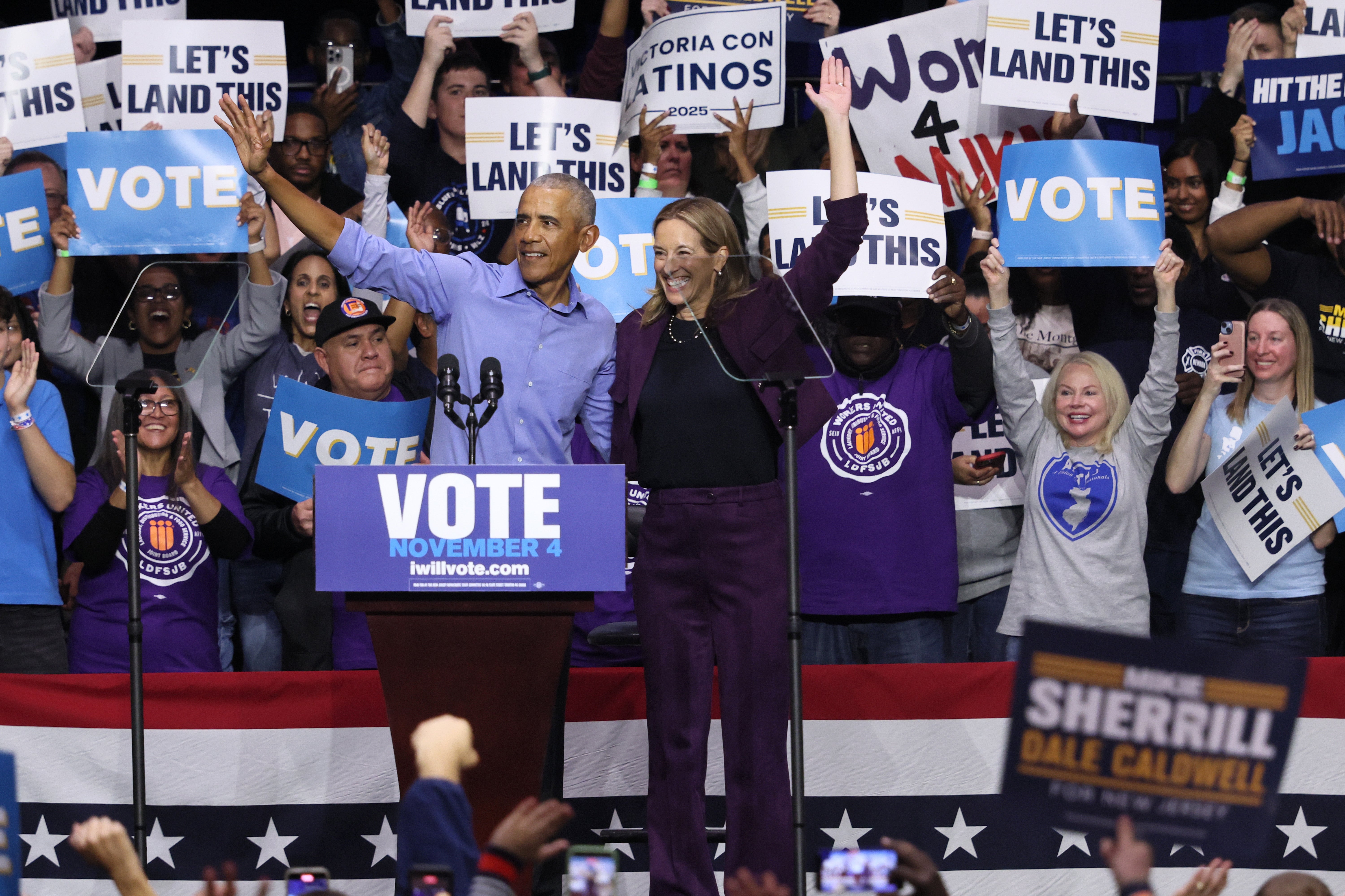 Former President Barack Obama and New Jersey Democratic gubernatorial candidate, U.S. Rep. Mikie Sherrill (D-NJ) wave after the conclusion of a Get Out the Vote Rally at Essex County College Gymnasium on November 01, 2025 in Newark, New Jersey.