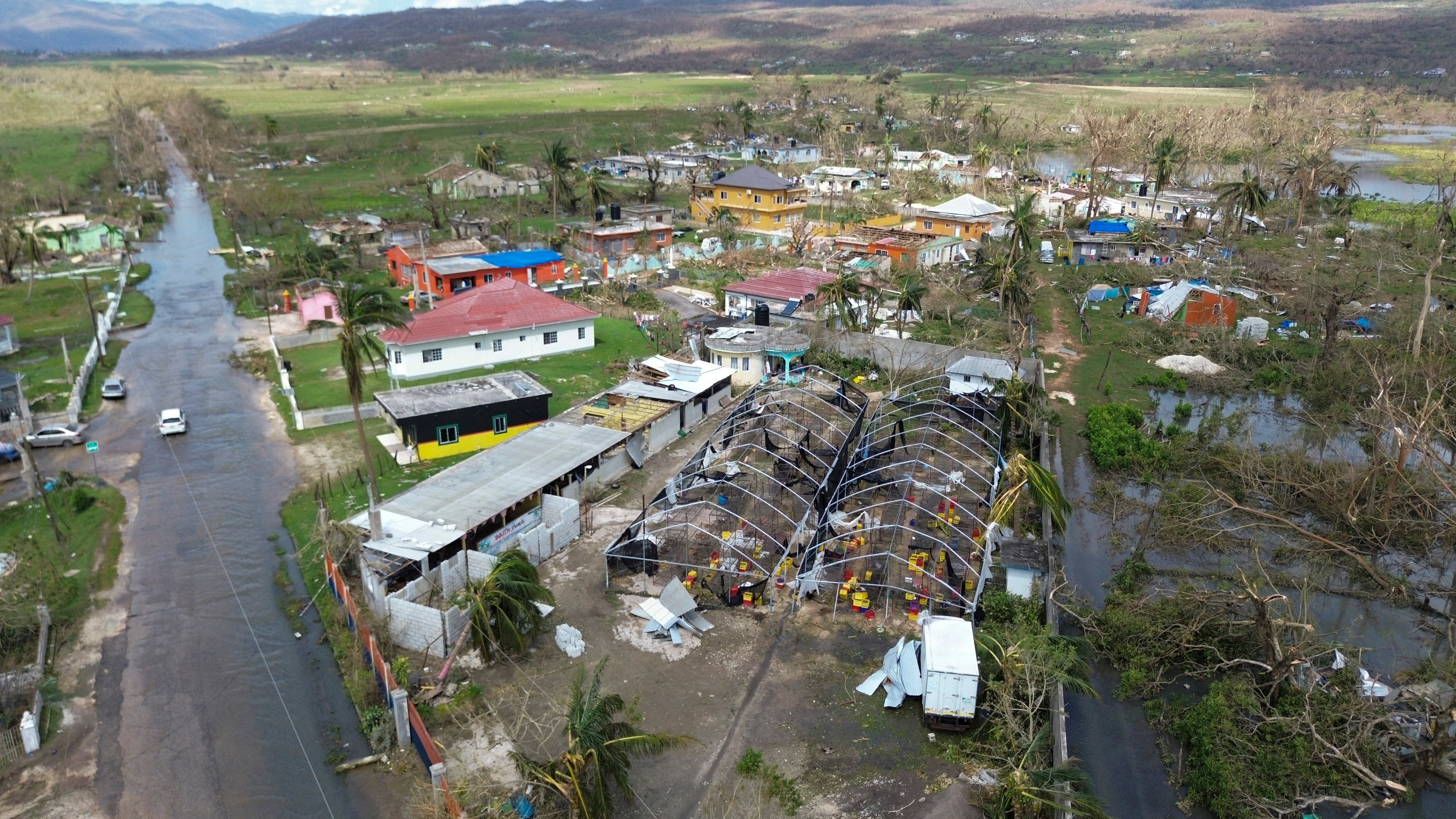 Flooding and damaged buildings are seen in the aftermath of Hurricane Melissa in Lacovia, Jamaica, last week. The deadly storm was the island’s strongest on record