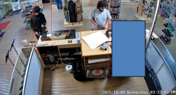 Ali and the other defendant in the case, Majed Mahmoud, at Downriver Guns, a gun store and range with several locations in Michigan ahead of their arrests