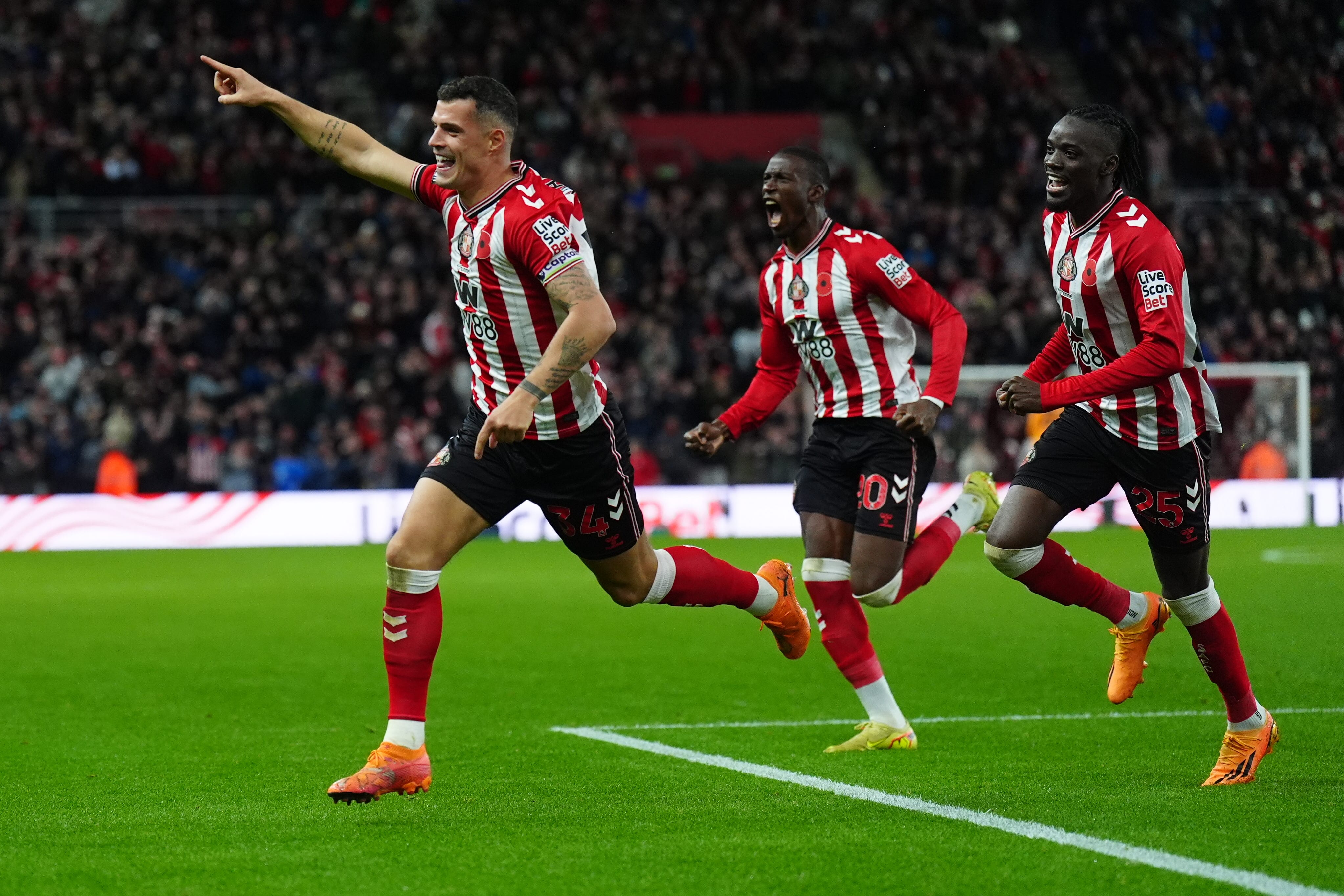 Sunderland’s Granit Xhaka, left, celebrates his second-half equaliser