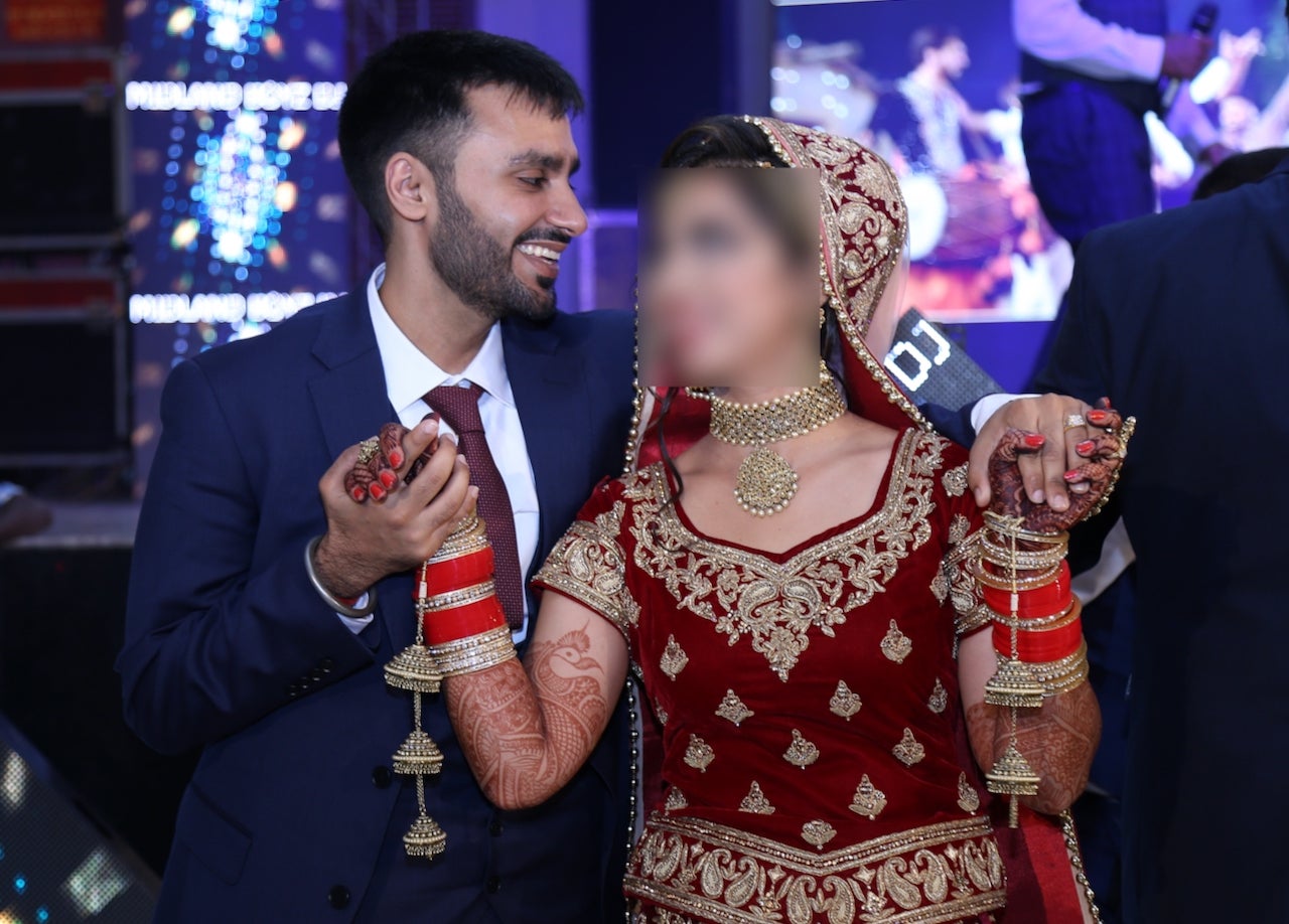 Jagtar Singh Johal and his wife Gurpreet Kaur at their wedding in 2017 (Family Handout/PA)