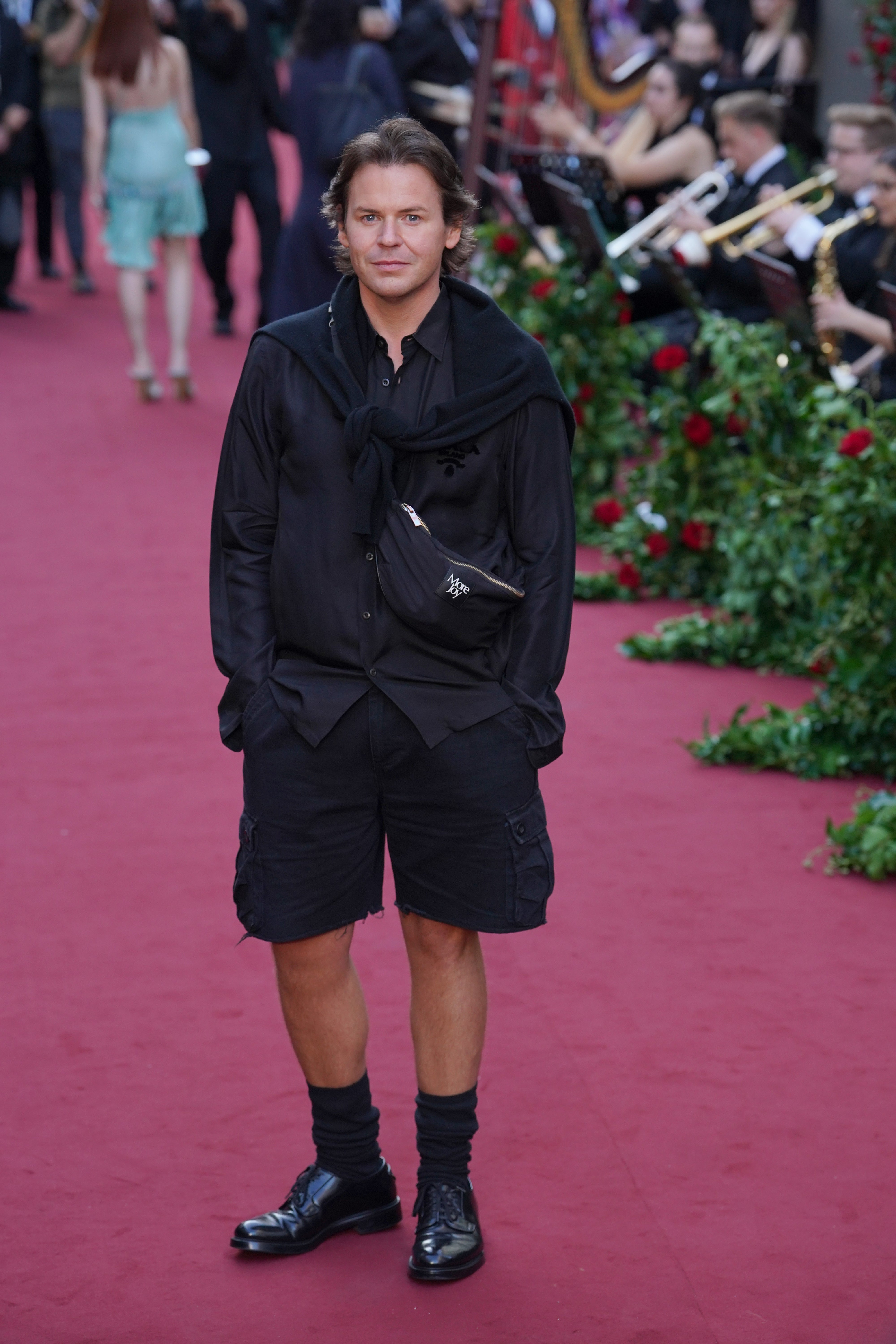 Christopher Kane called the Queen’s wardrobe a ‘masterclass in silhouette, construction, repetition, symbolism and restraint’