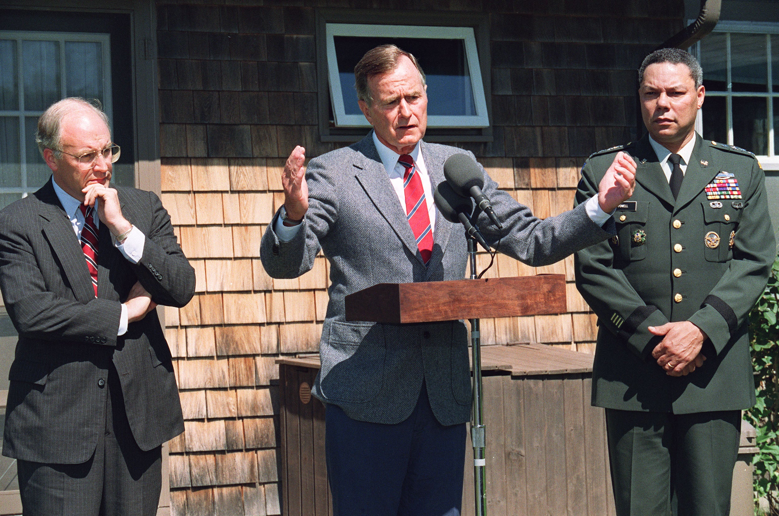 Then-Secretary of Defense Cheney is pictured with former President George H. W. Bush in August 1990