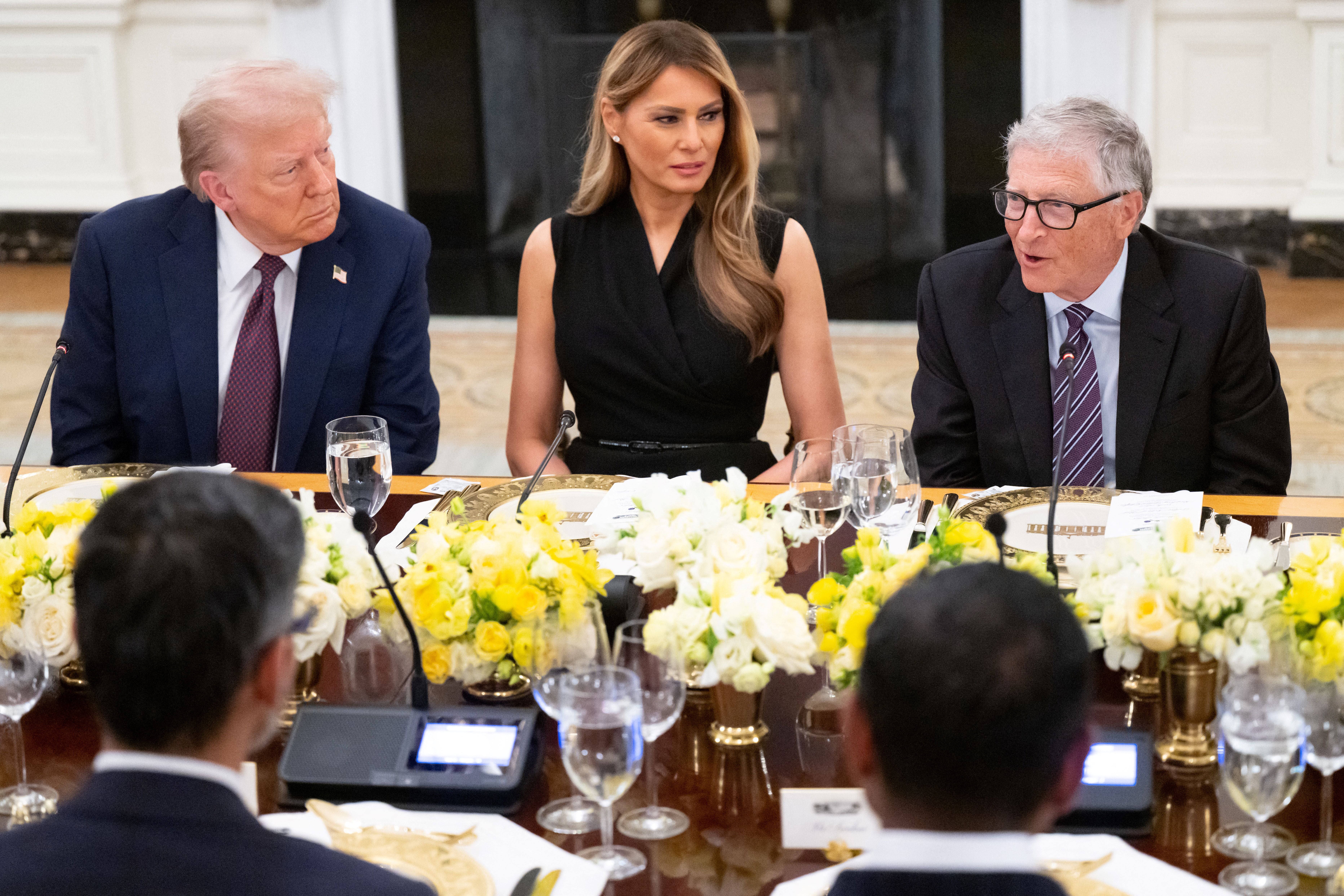 President Donald Trump and First Lady Melania Trump have dinner with Bill Gates at the White House last September. In addition to pushing back on Trump, Gates is also fighting blowback from scientists who blasted his understanding of the climate crisis