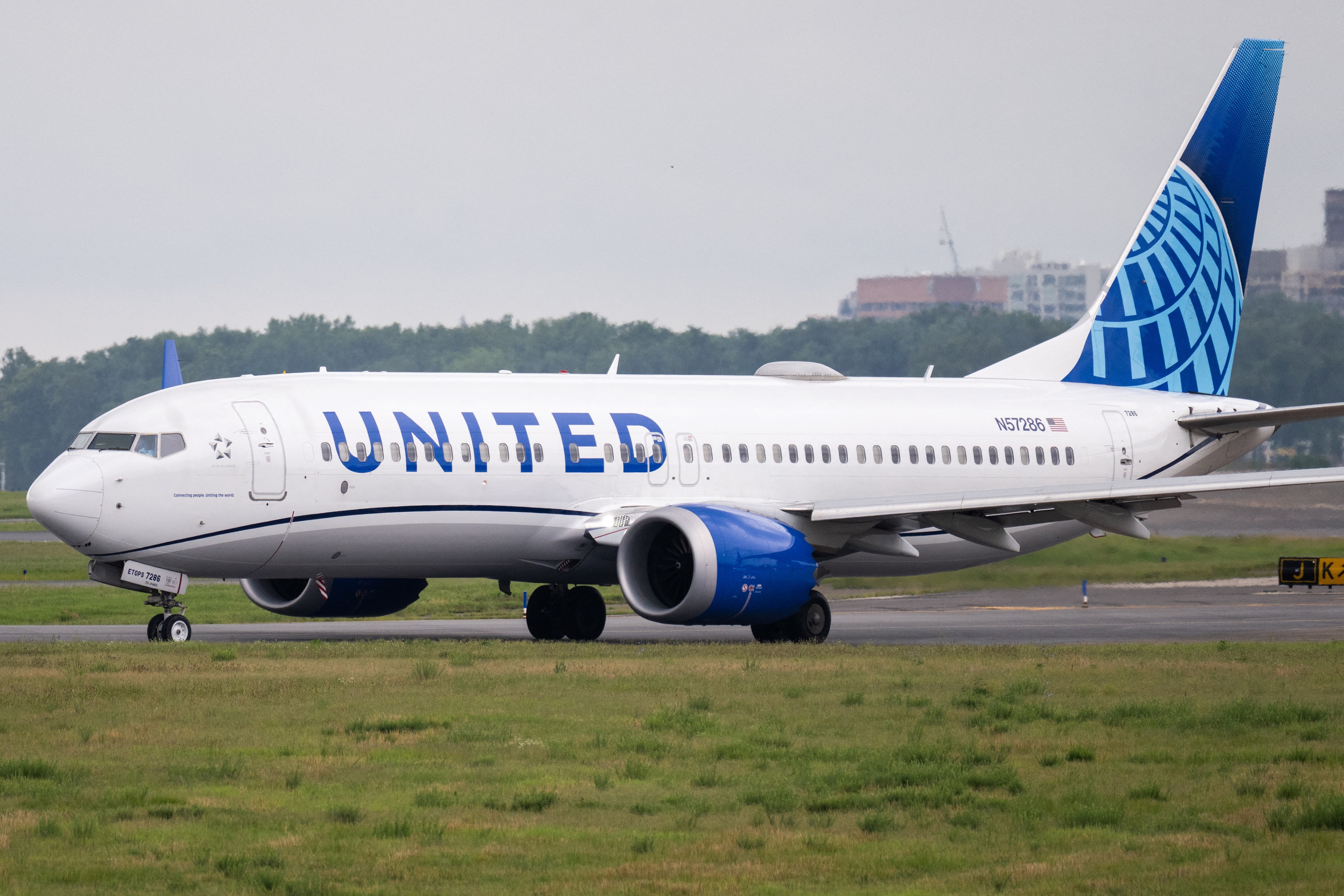A United Airlines plane is pictured at Reagan Airport, just outside of Washington, D.C. A threat was made against a United plane at DCA Tuesday afternoon, temporarily halting air traffic at the airport