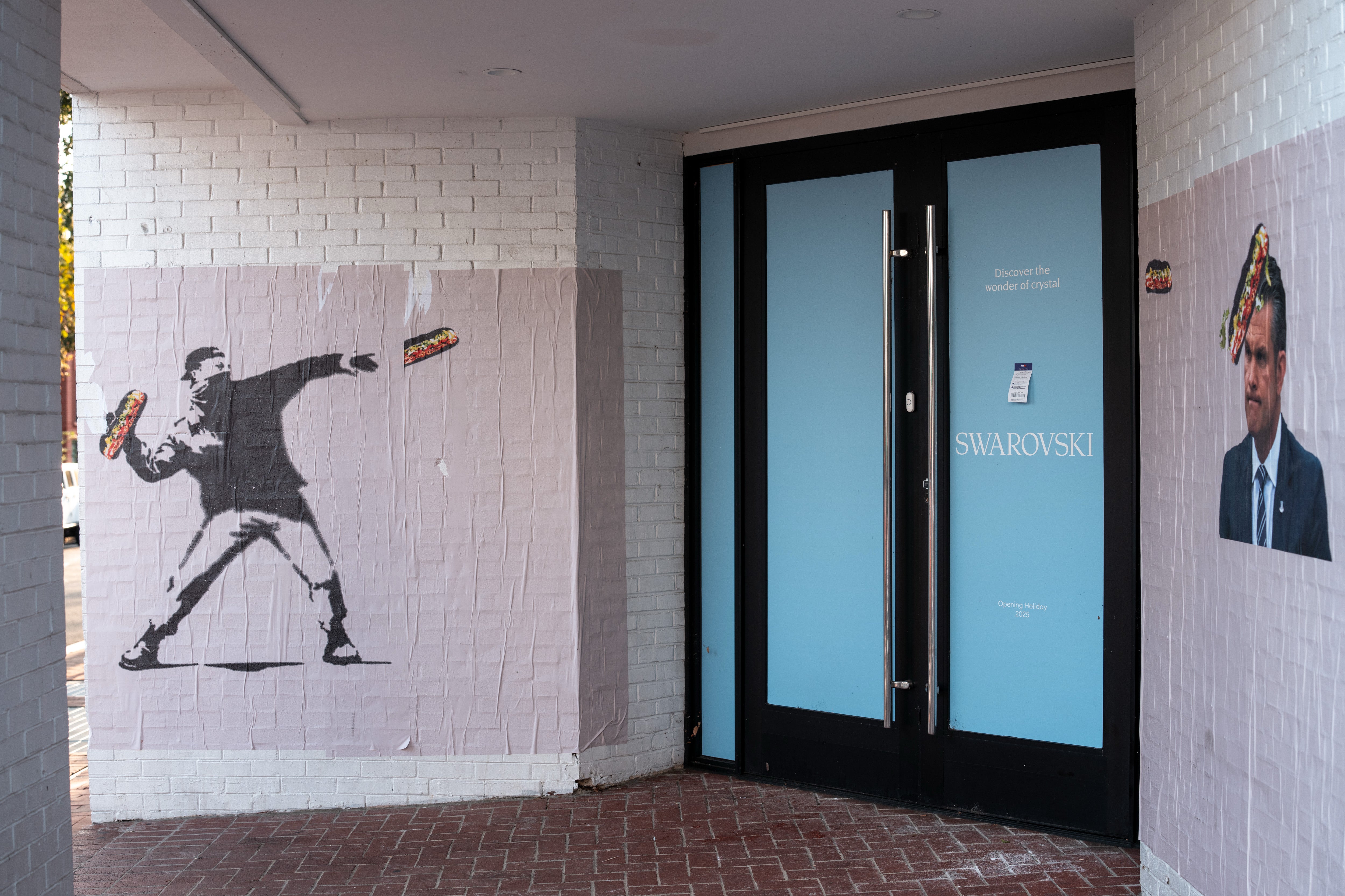 A bystander's cellphone video of the confrontation went viral on social media, turning Dunn into a symbol of resistance against Trump’s monthslong federal takeover. Murals depicting him mid-throw popped up in the city virtually overnight