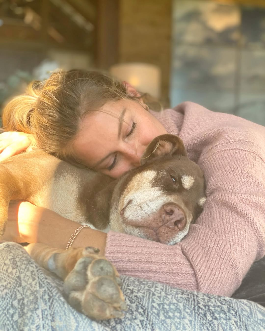 Tom Brady’s ex-wife Gisele Bundchen with their late dog, who died in 2023
