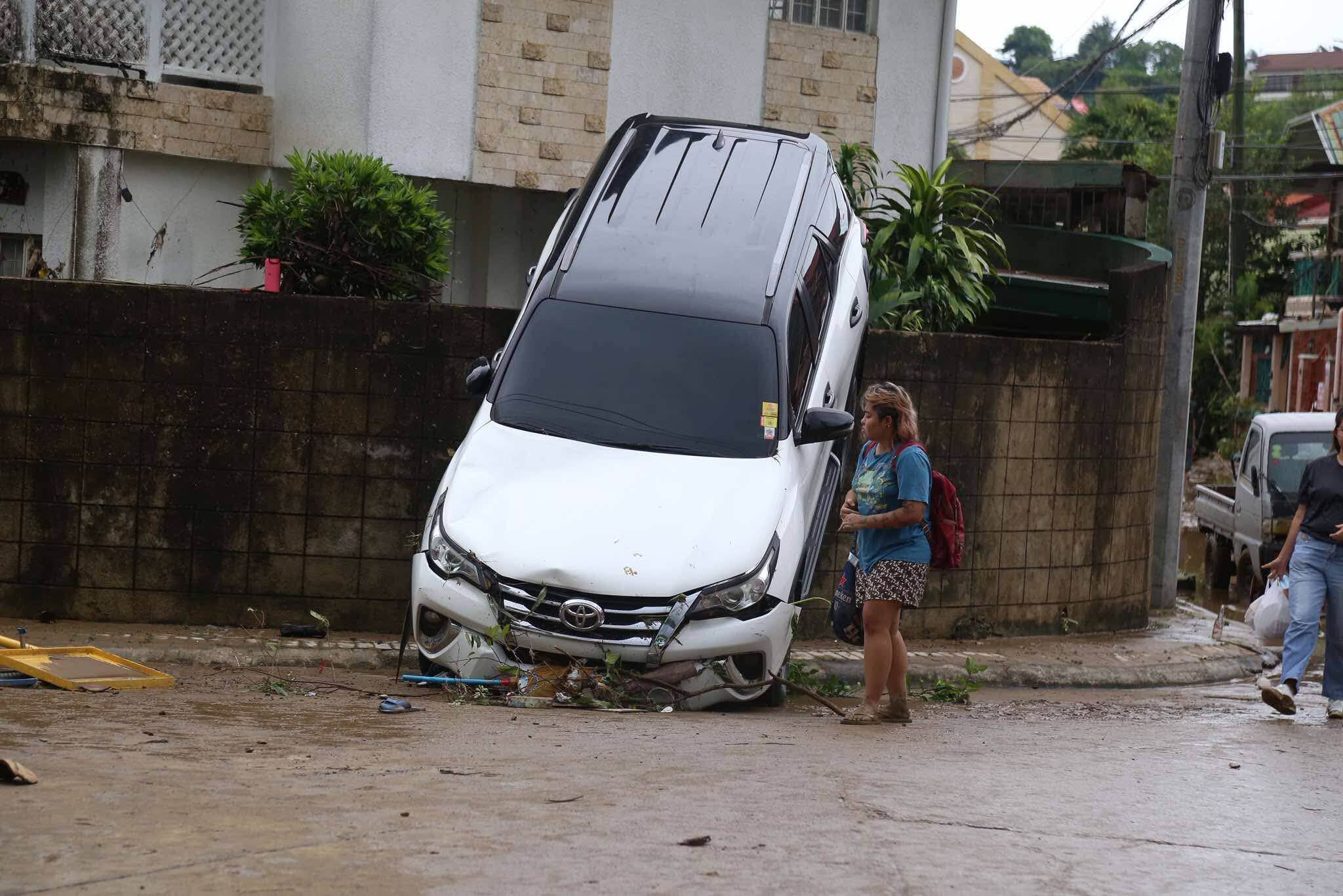A damaged vehicle is seen after Kalmaegi hit Cebu city in central Philippines