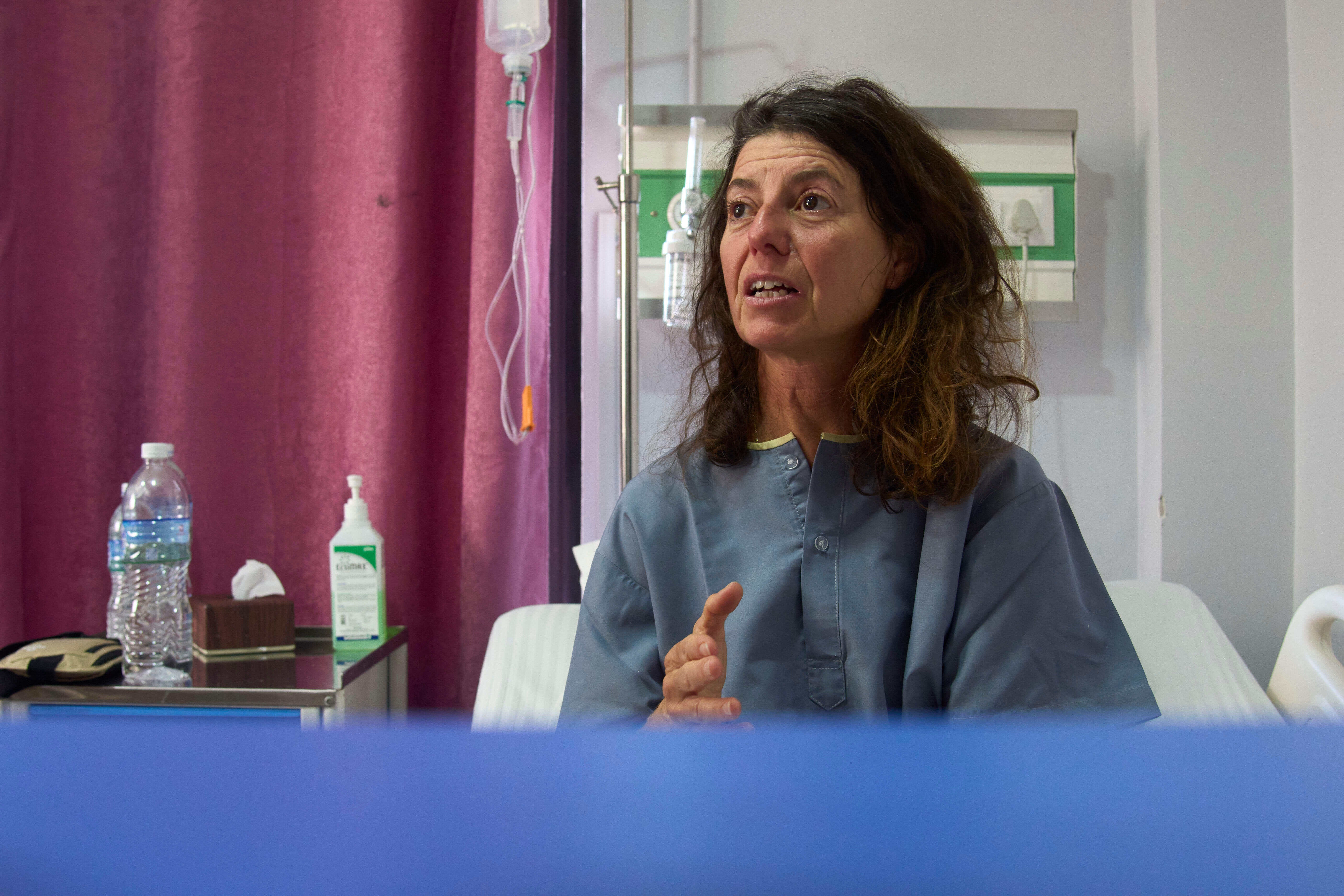 Isabelle Solange, a survivor of an avalanche on Mount Yalung Ri, speaks to the media after being rescued and airlifted to a hospital in Kathmandu, Nepal, Tuesday