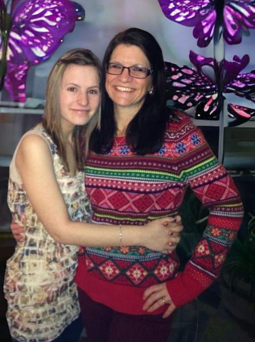 Emily, pictured with her mother Julia Styles, didn't have a rash only flu-like symptoms and a migraine