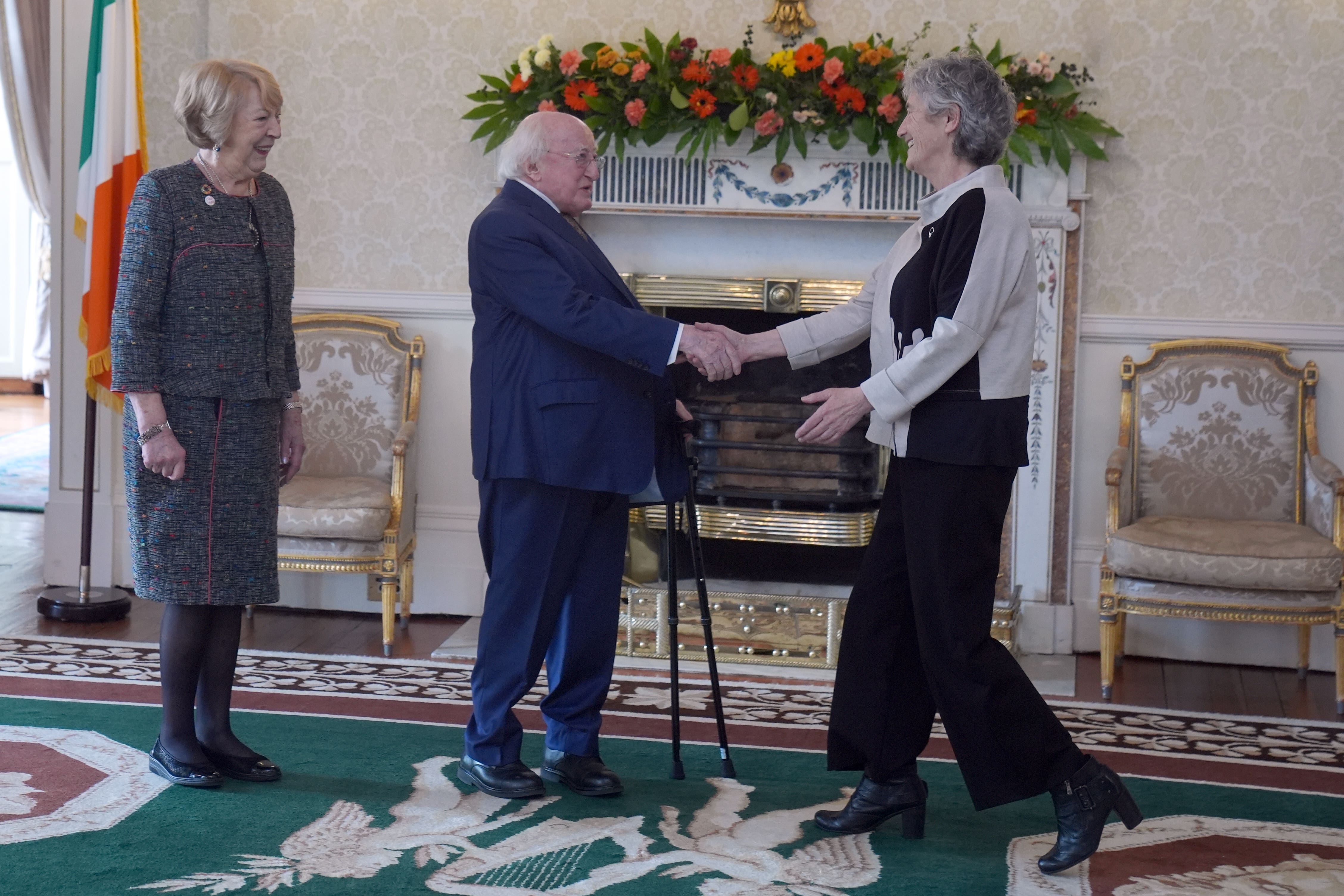 President Michael D Higgins and his wife Sabina receive Catherine Connolly at Aras an Uachtarain, Dublin (Brian Lawless/PA)