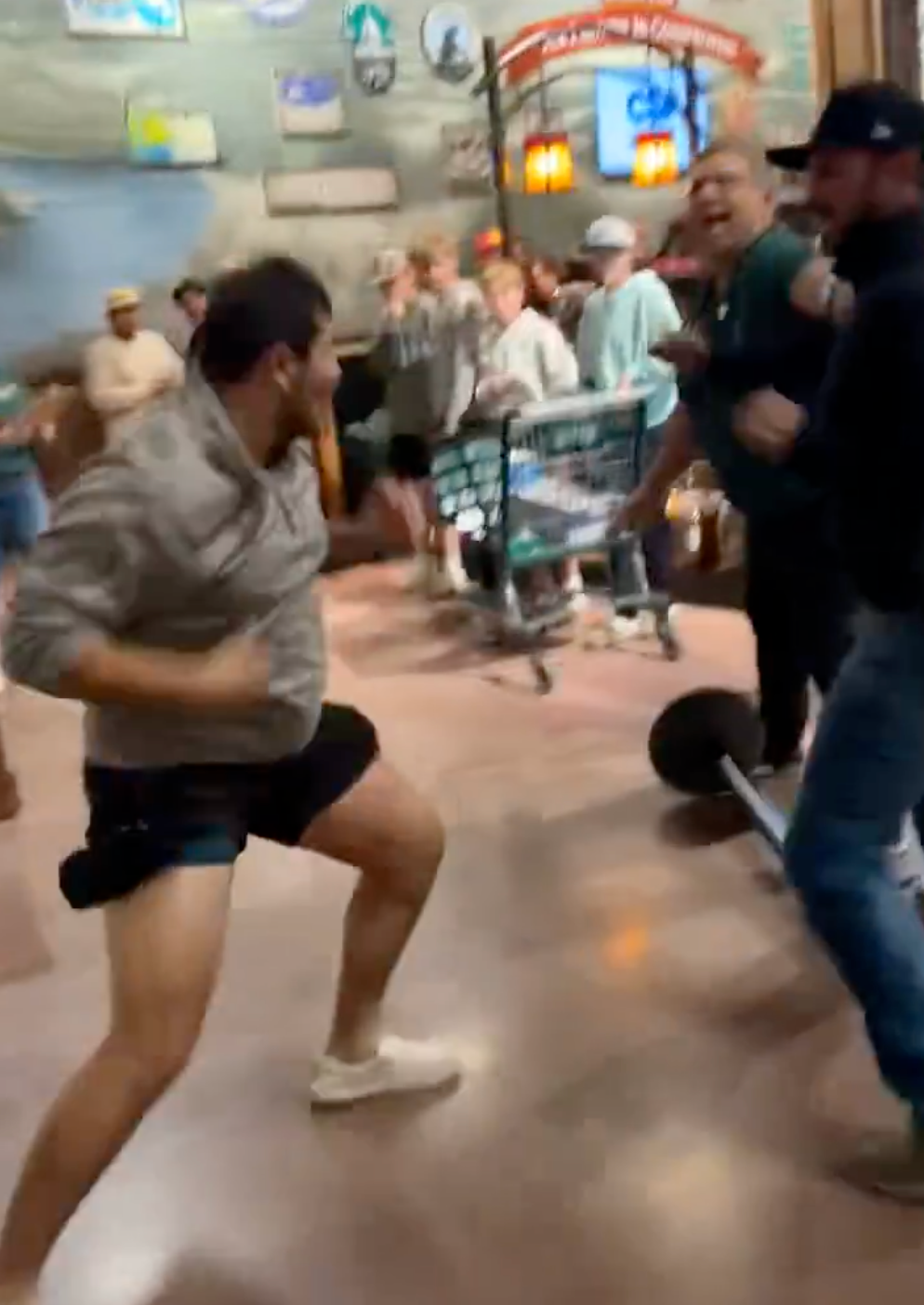 Footage posted on X shows several men exchanging punches in front of stunned onlookers