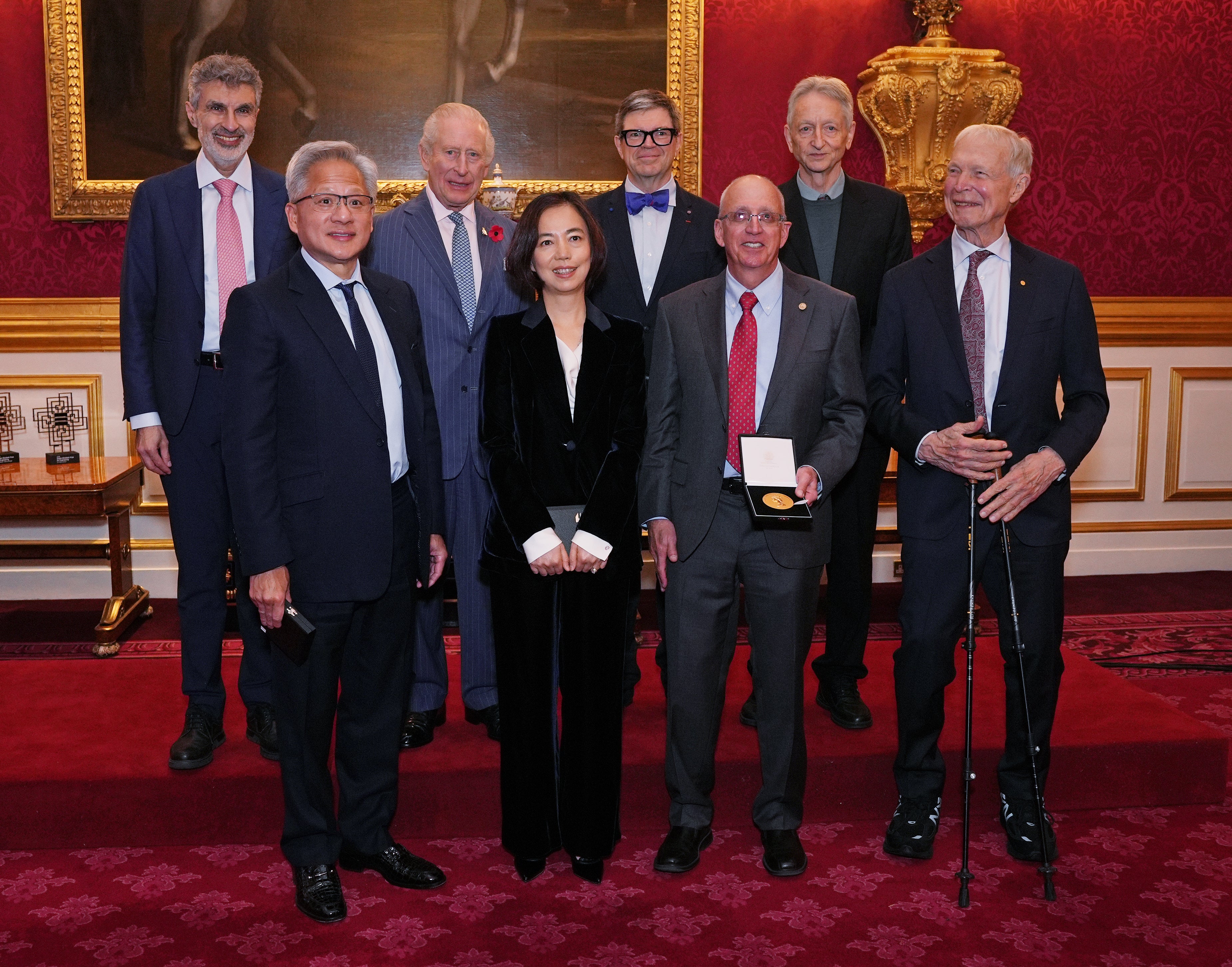 Charles (top row, 2nd left) poses for a group photo with the recipients. (top row, left-right) Professor Yoshua Bengio, Dr. Yann LeCun, Professor Geoffrey Hinton, (bottom row, left-right) Jensen Huang, Dr. Fei-Fei Li, Dr. Bill Dally and Professor John Hopfield (Yui Mok/PA)