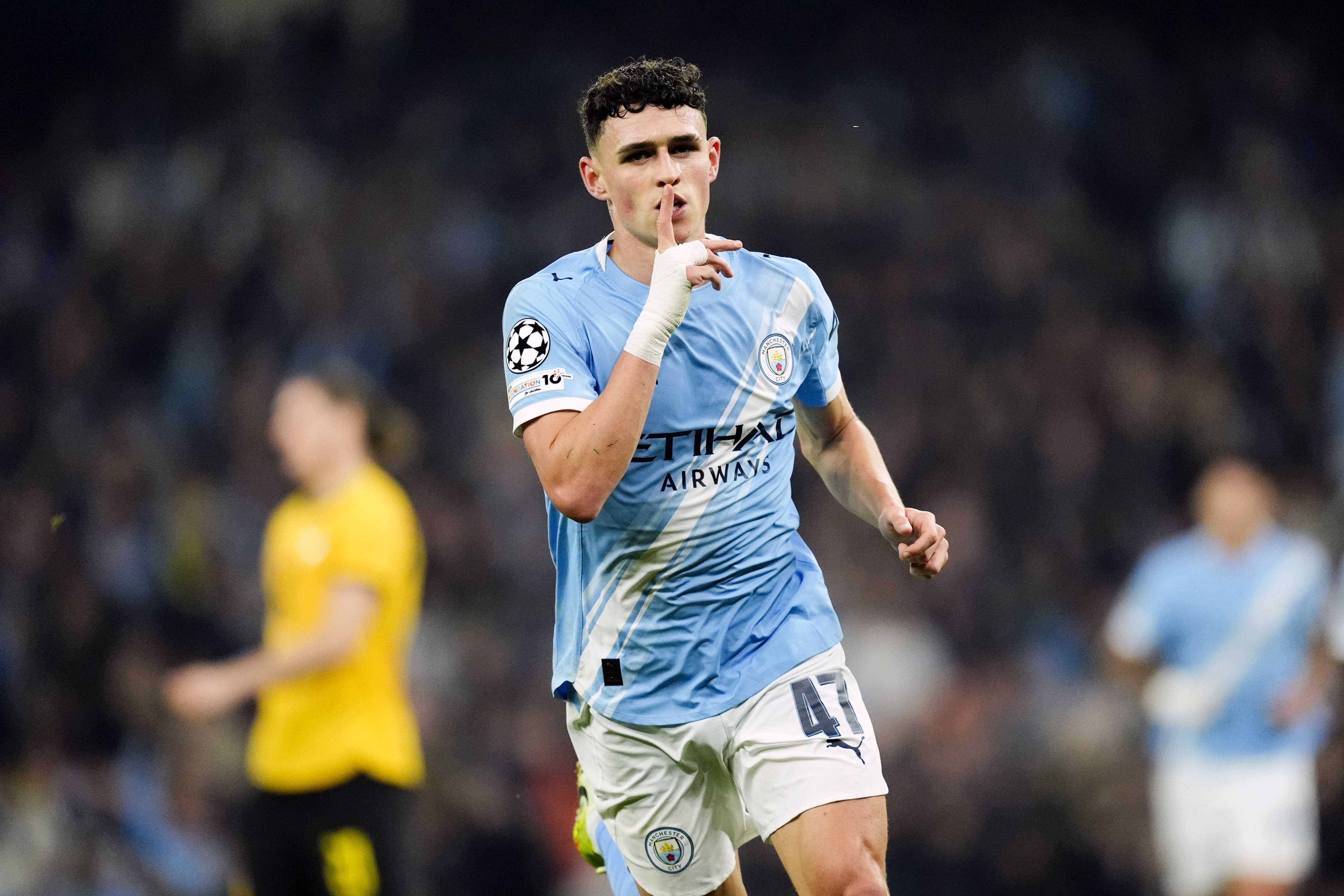 Phil Foden scored twice against Borussia Dortmund (Nick Potts/PA)