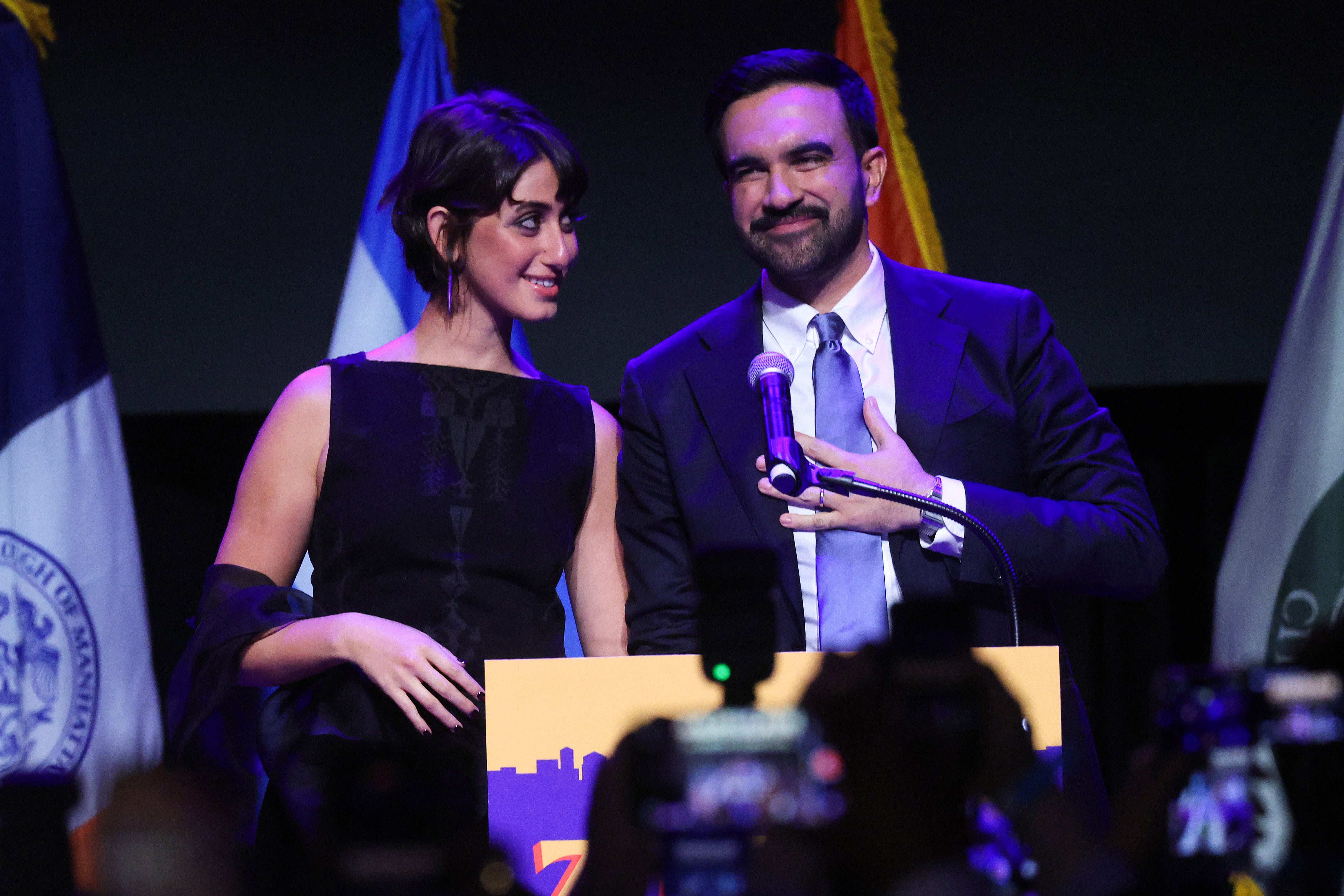 <p>New York City Democratic mayoral candidate Zohran Mamdani stands with his wife Rama Duwaji at his election night watch party at the Brooklyn Paramount </p>