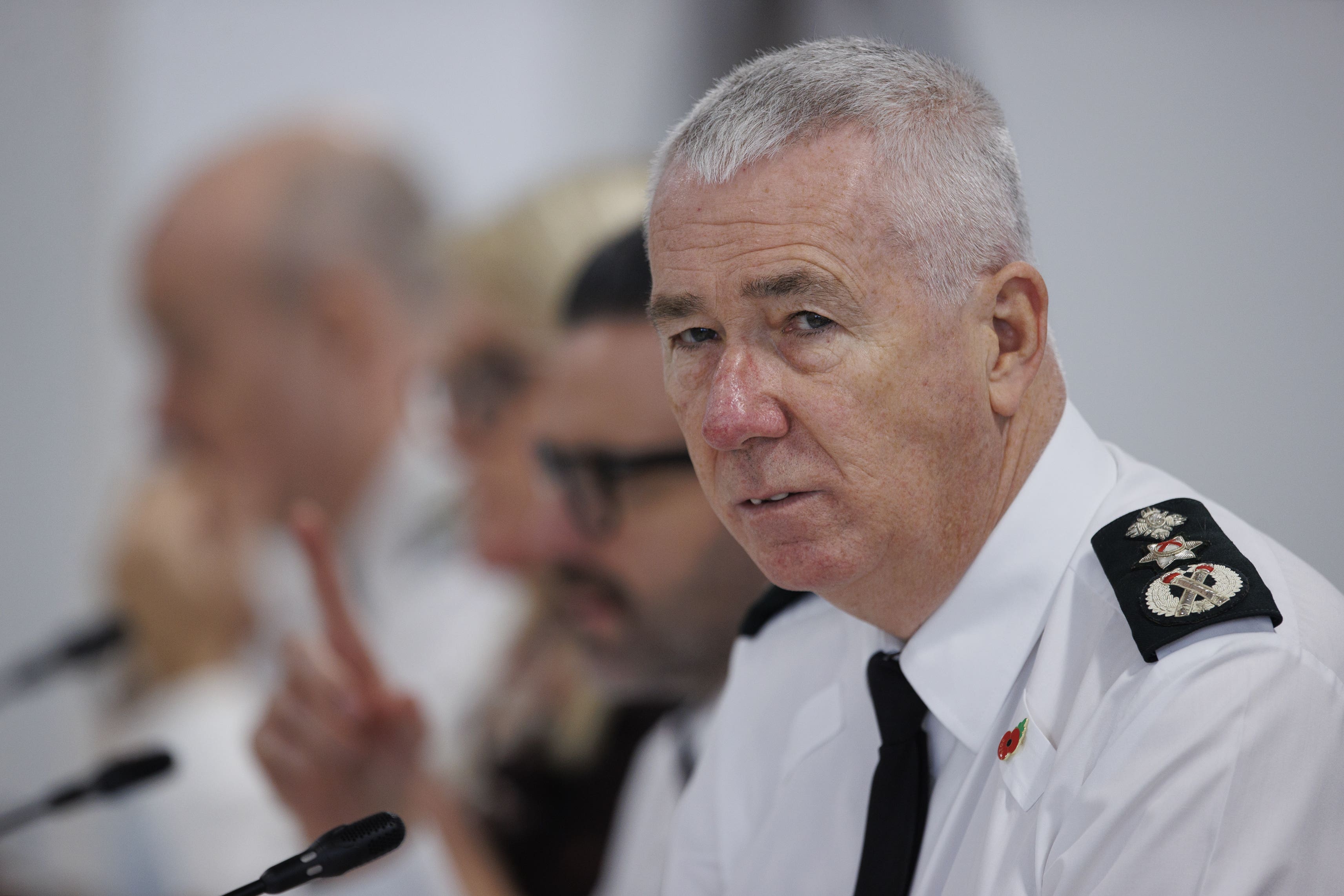 Police Service of Northern Ireland Chief Constable Jon Boutcher listens during a meeting of the Policing Board (Liam McBurney/PA)