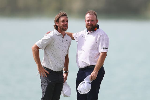 <p>Tommy Fleetwood (left) and Shane Lowry at the Abu Dhabi HSBC Championship</p>