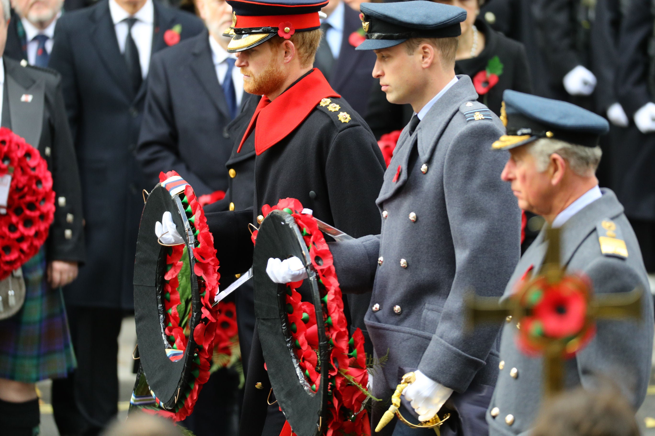 Charles with his sons William and Harry at the Cenotaph on Remembrance Sunday in 2017