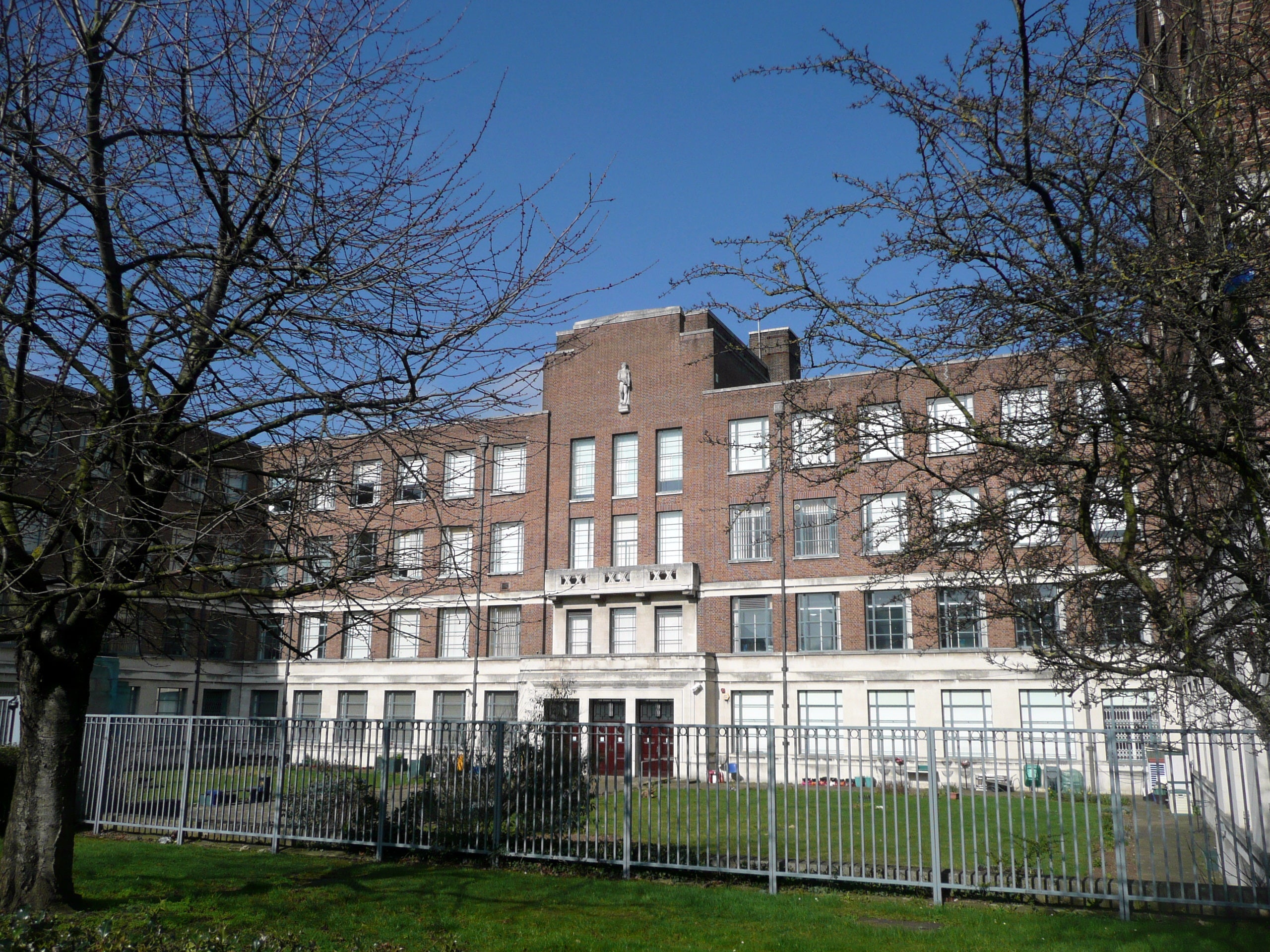 The college has since reopened after locking down, with multiple police cars and officers still on the scene