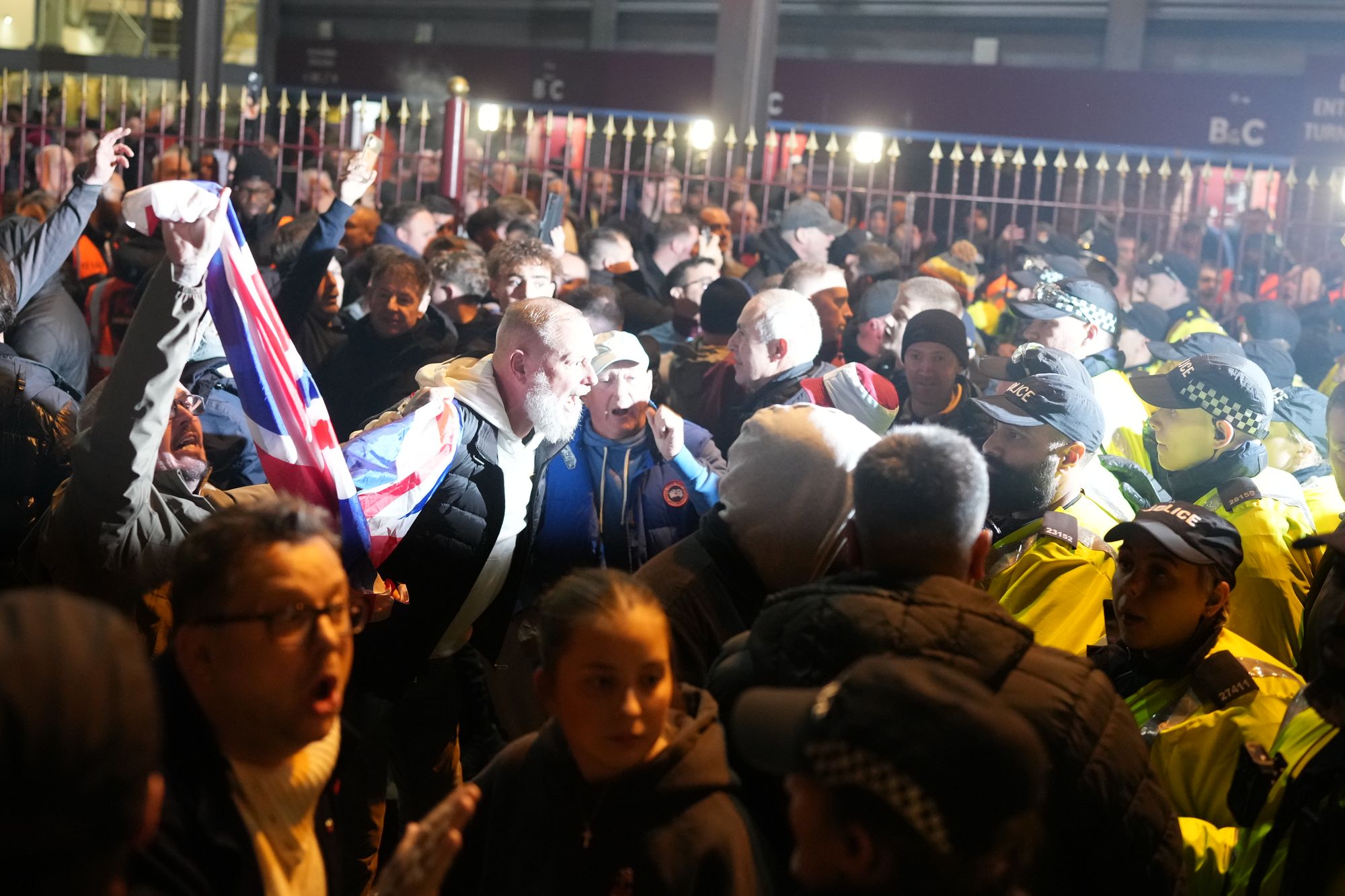 Some Villa fans clashed with protestors as police intervened