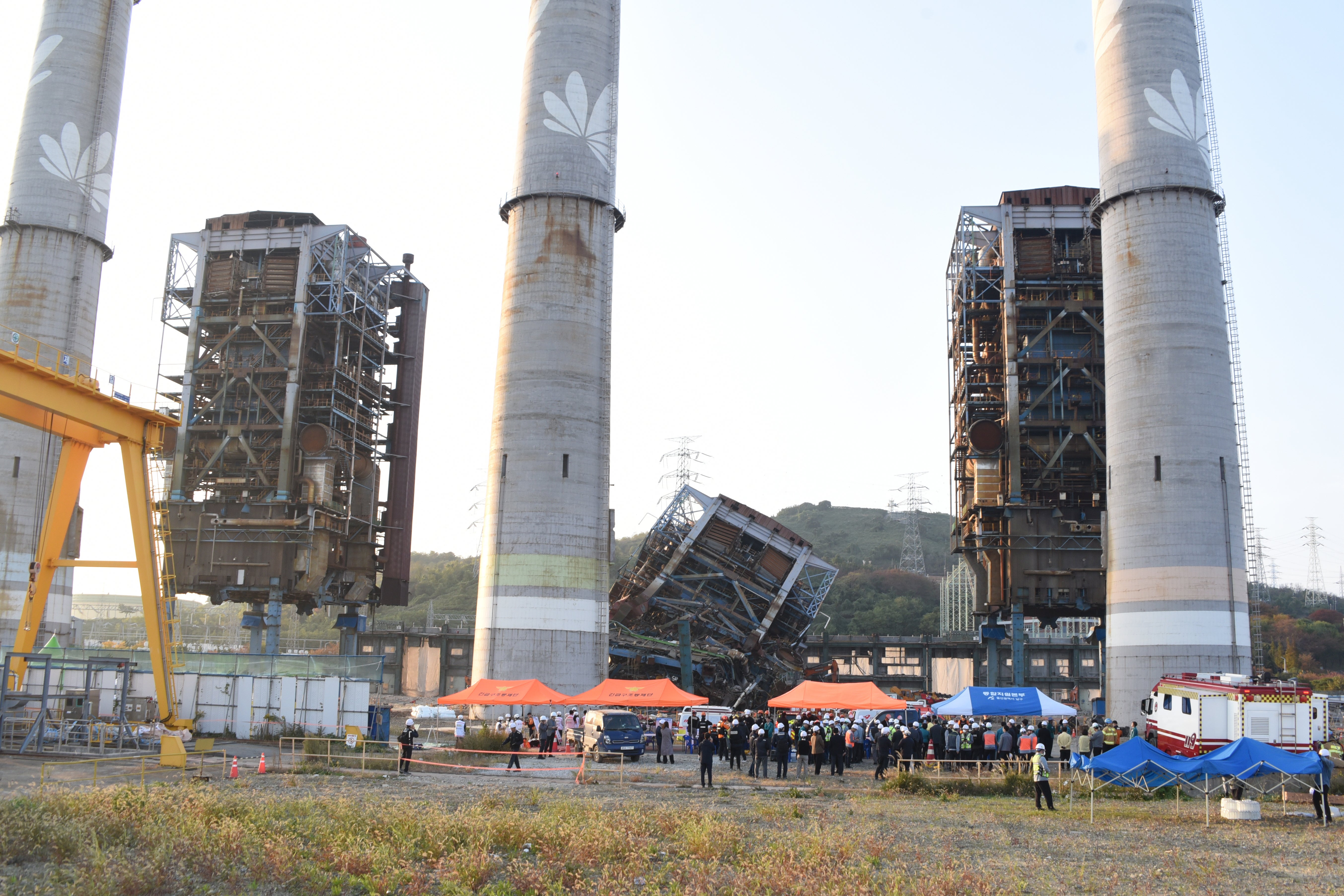 <p>Rescue teams work at the site of a tower collapse in Ulsan, South Korea</p>