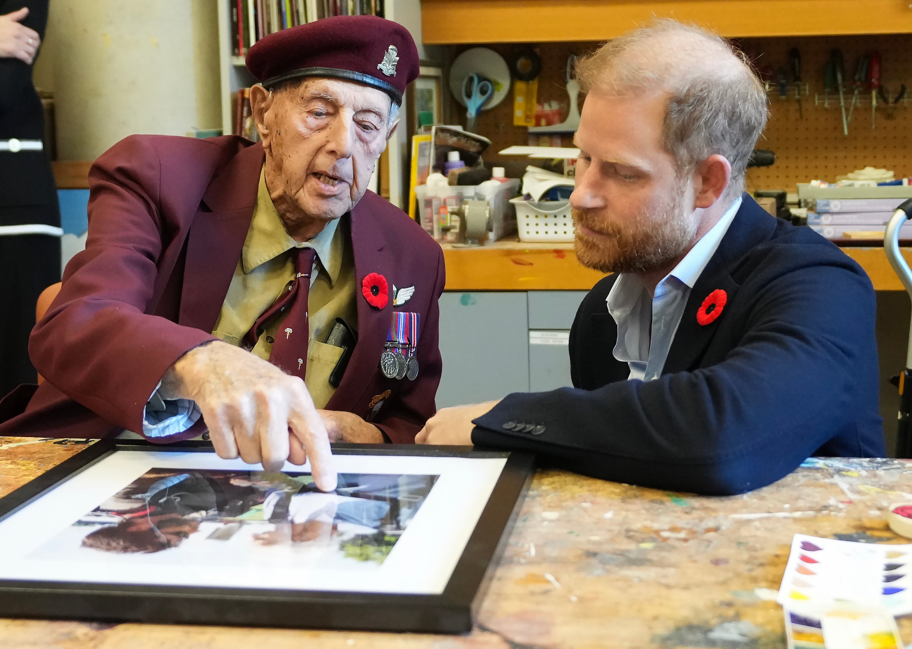 Harry, right, talks with Ed Marshall as he meets with some of Canada’s oldest veterans