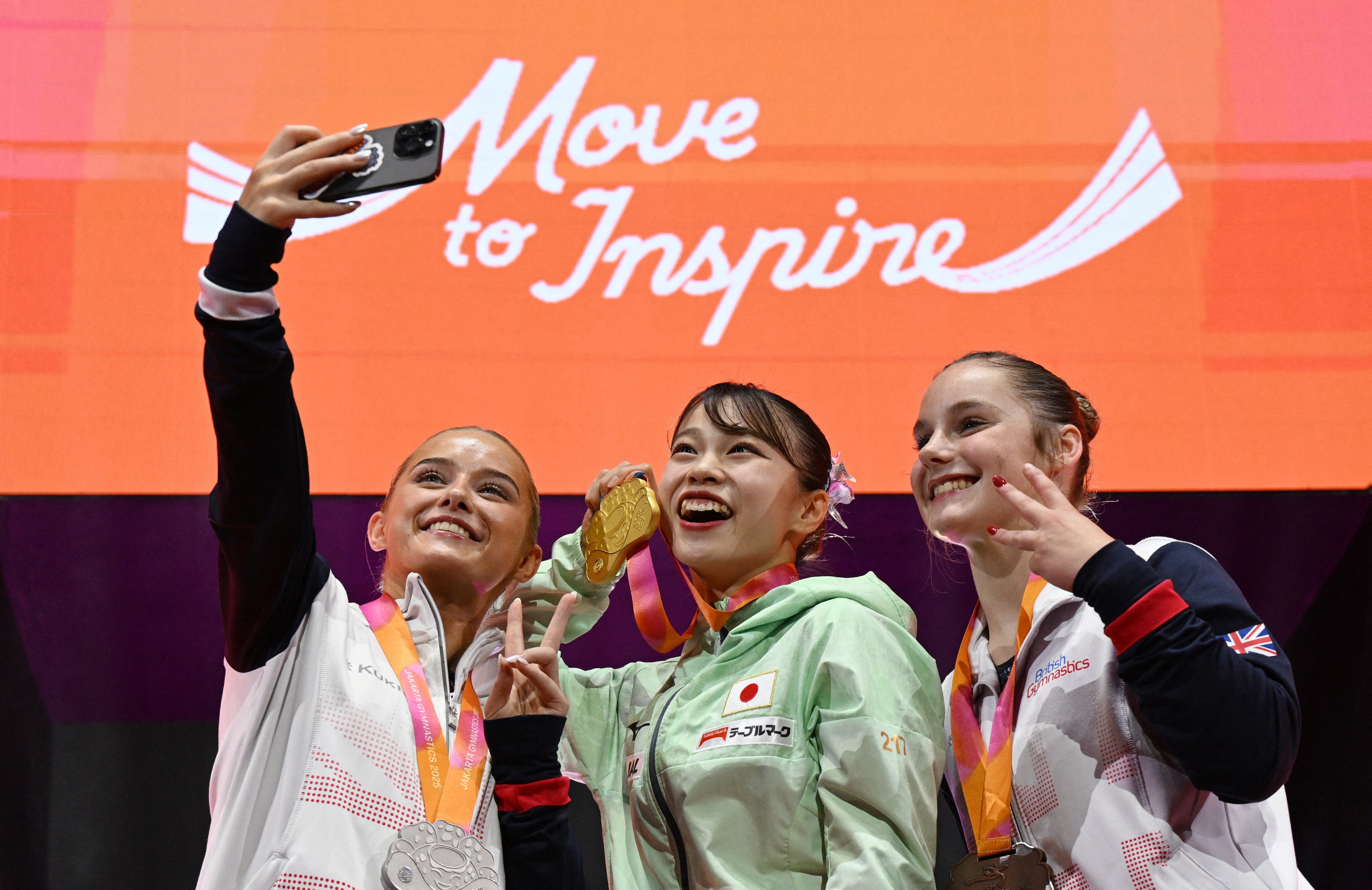 Martin joined Japan's Aiko Sugihara and teammate Ruby Evans on the podium, with both Brits becoming world medallists for the first time