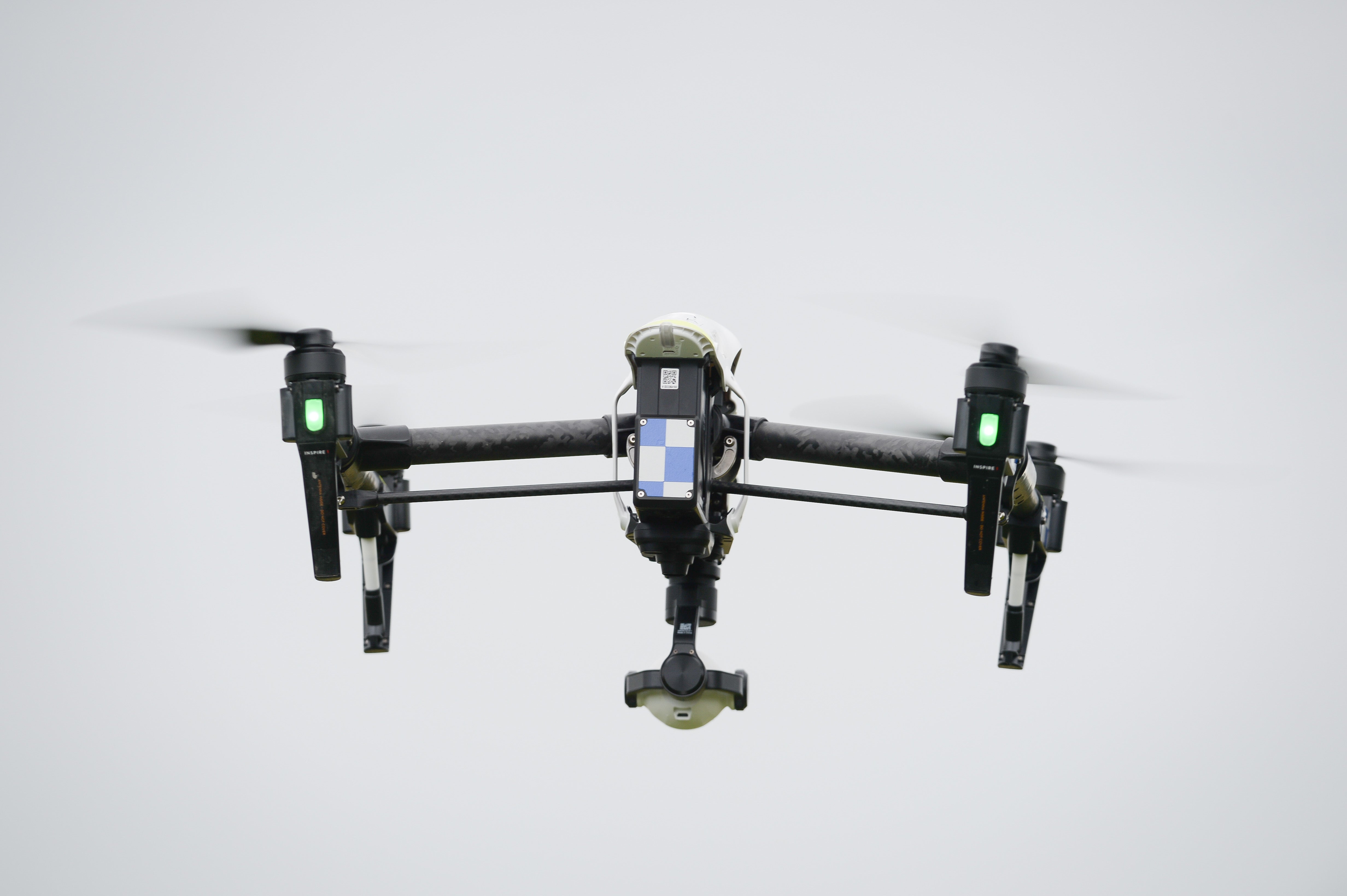 A DJI Inspire Police Drone flies as Devon & Cornwall and Dorset Police launch the UK’s first fully operational drone unit used by police at Westpoint Arena in Clyst St Mary, near Exeter