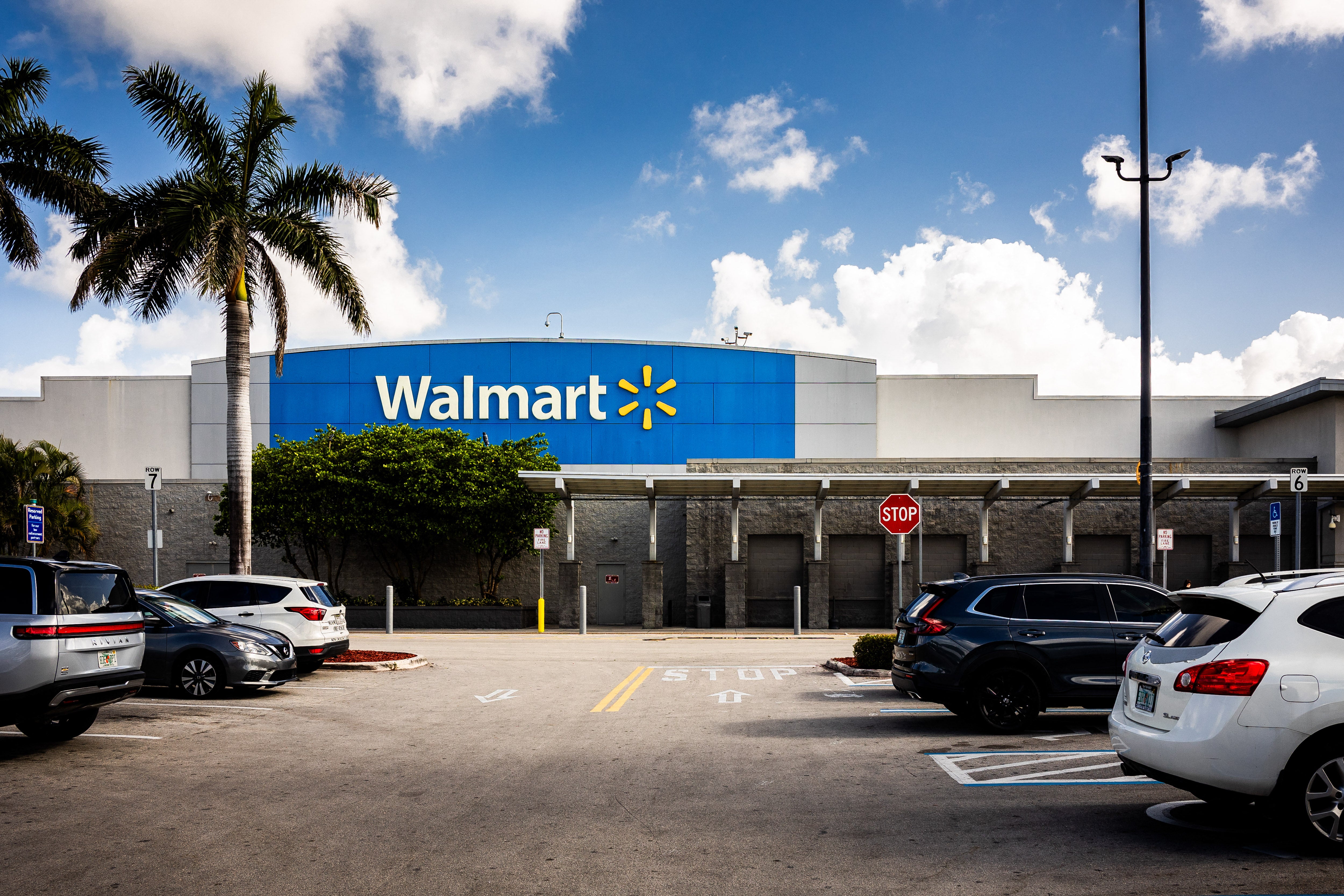 Car park and storefront with logo of a Walmart store and supermarket in Florida City in Florida State in the United States of America (USA) on August 5, 2025