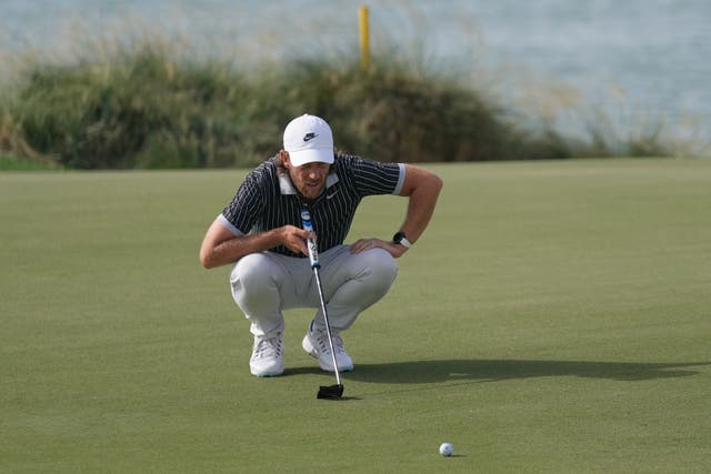 <p>Tommy Fleetwood shares the lead in Abu Dhabi</p>