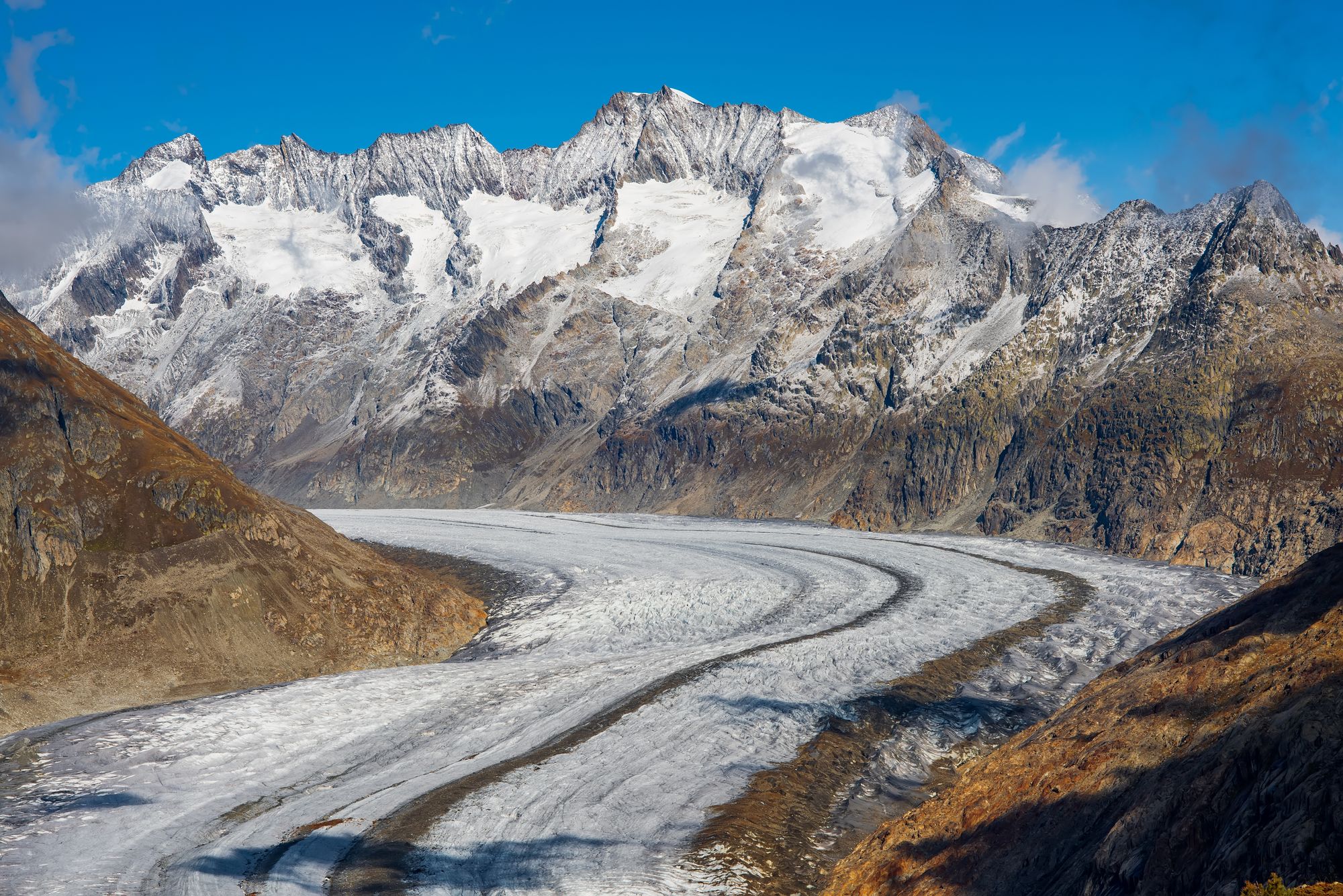 Aletsch Glacier flows for roughly 14 miles through the heart of the Bernese Alps