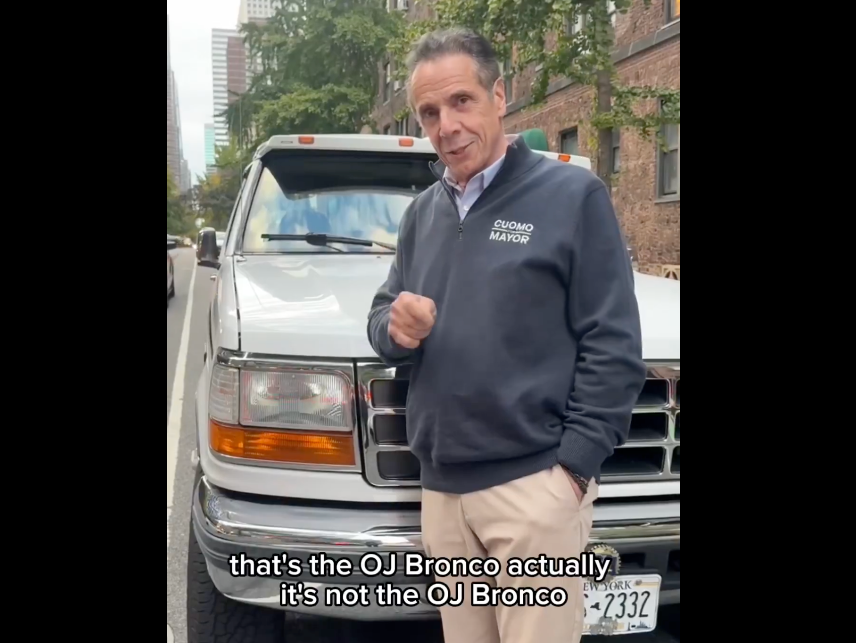 Former New York Governor Andrew Cuomo next to his 'good luck truck,' which was recently ticketed