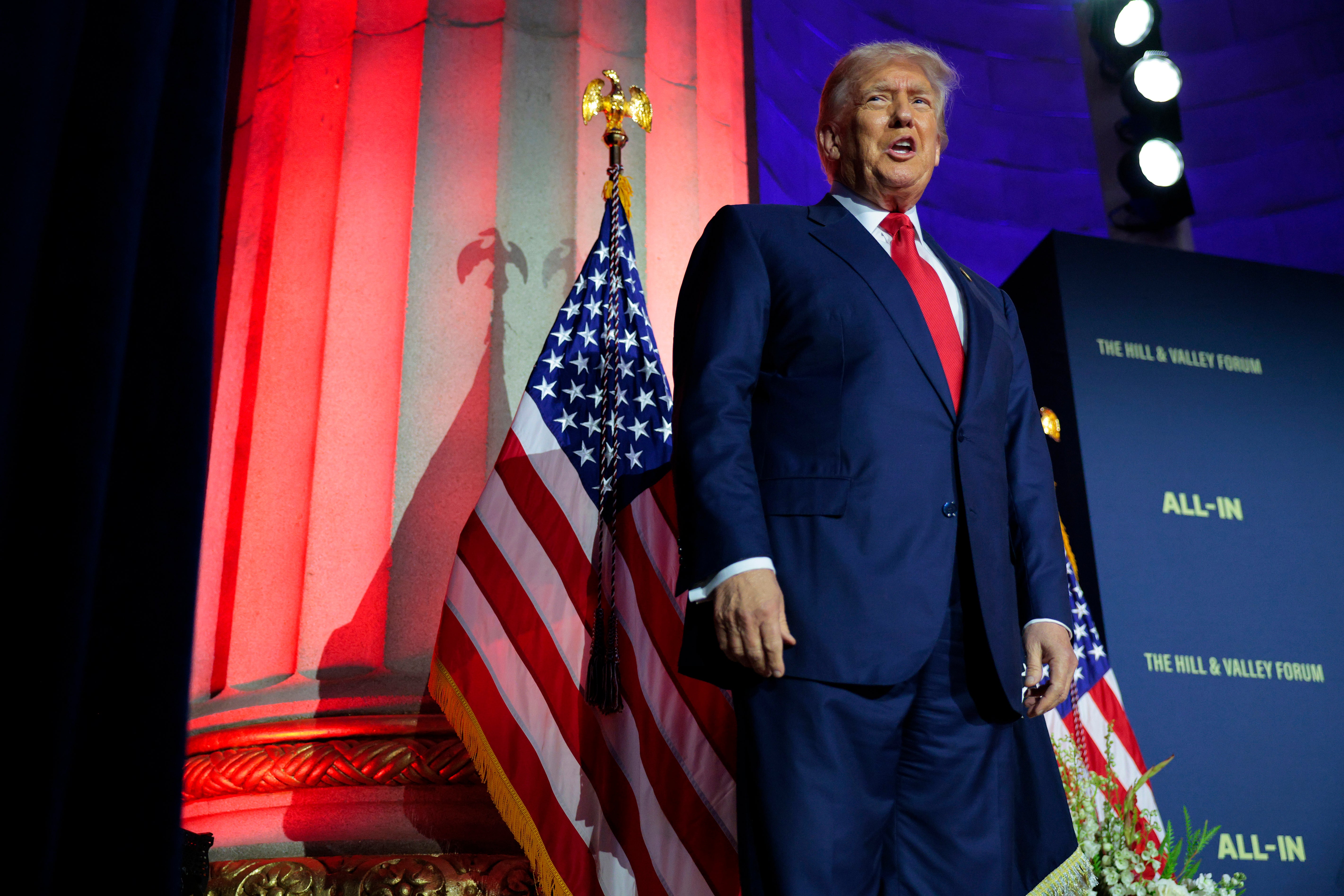 Donald Trump, seen here at a White House-sponsored AI event in 2025, has called for Congress to ban states from regulating Artificial Intelligence