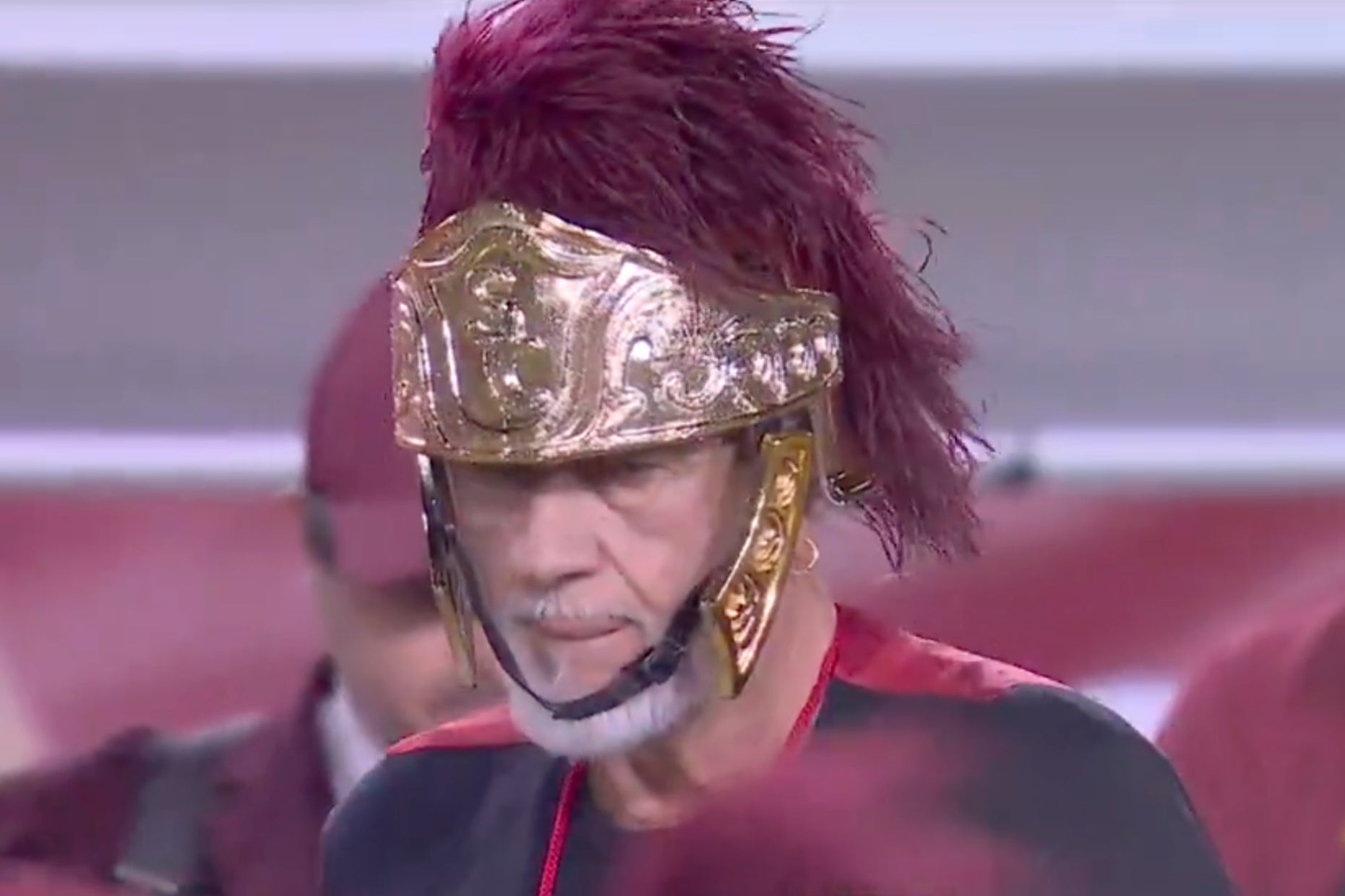 Mick Fleetwood of Fleetwood Mac wearing a Trojan helmet during a USC halftime show on November 8, 2025