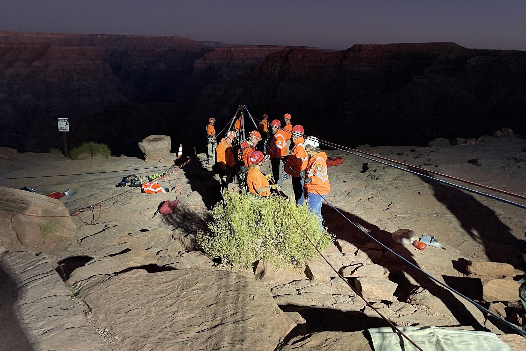 Technical rope technicians set up a lowering and raising system using ropes to recover the man before transporting his body to the Mohave County Medical Examiner's Office