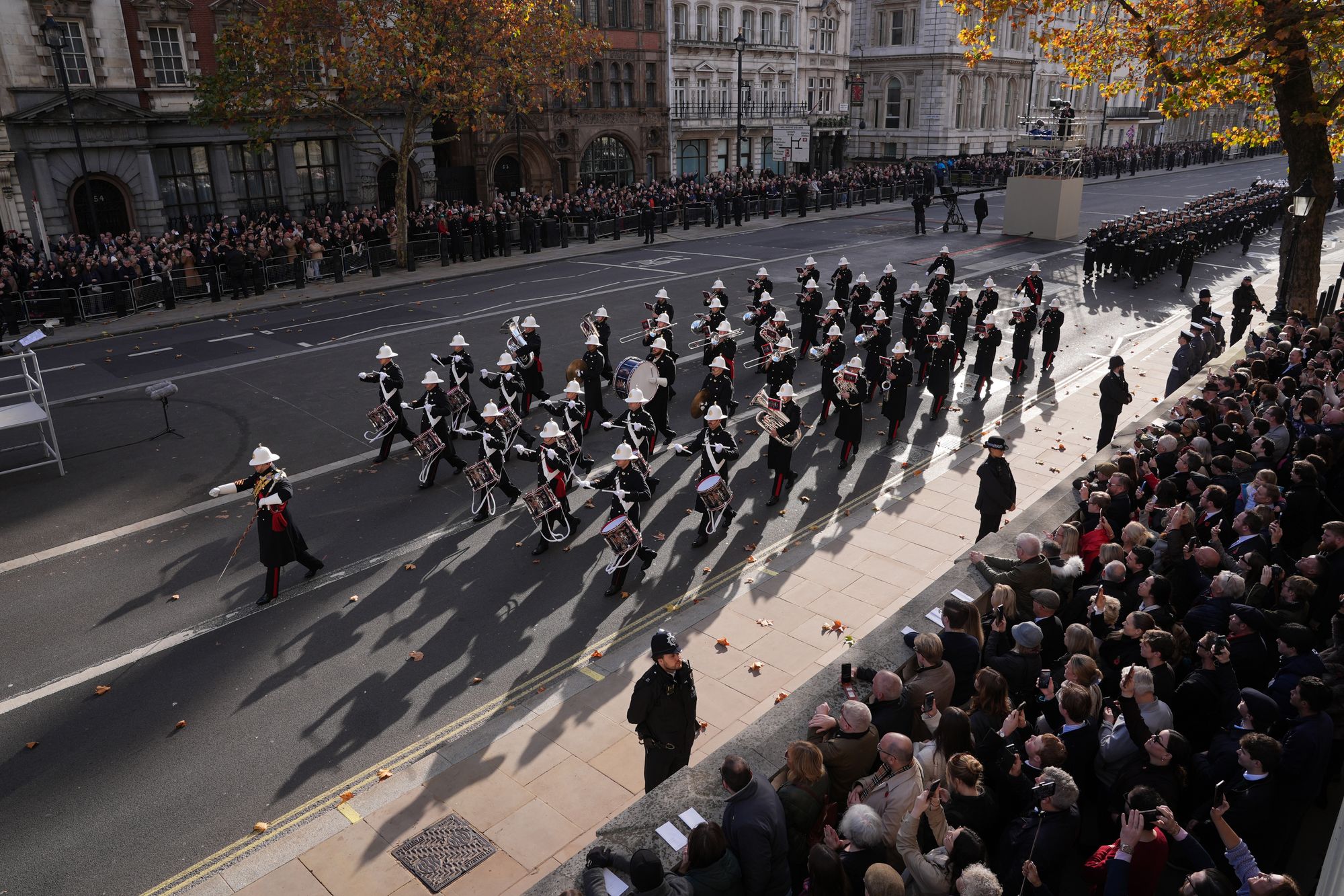 The Band of the Royal Marines march on Whitehall ahead of the Remembrance Sunday service at the Cenotaph in London