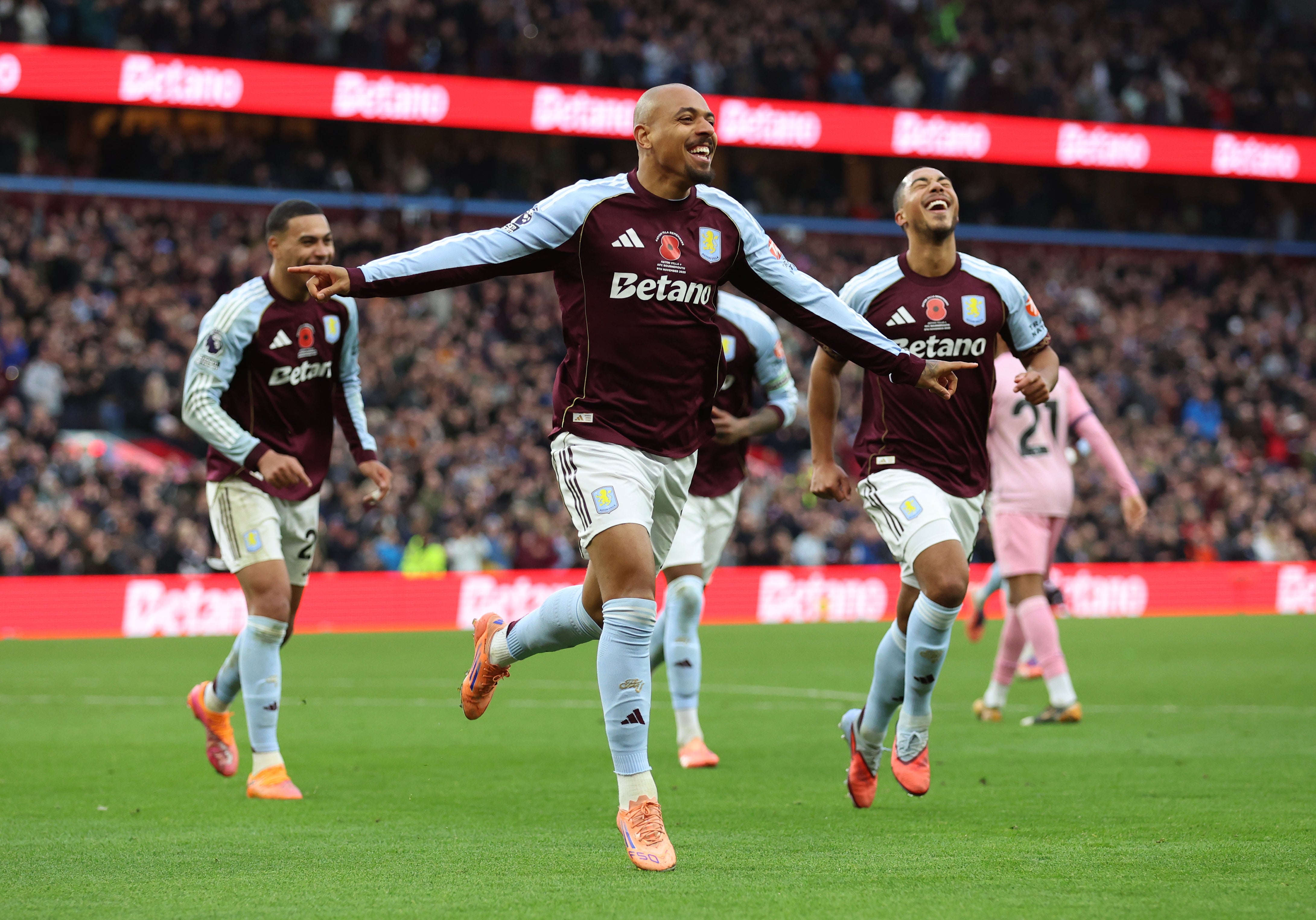 Donyell Malen celebrates scoring Aston Villa's fourth goal