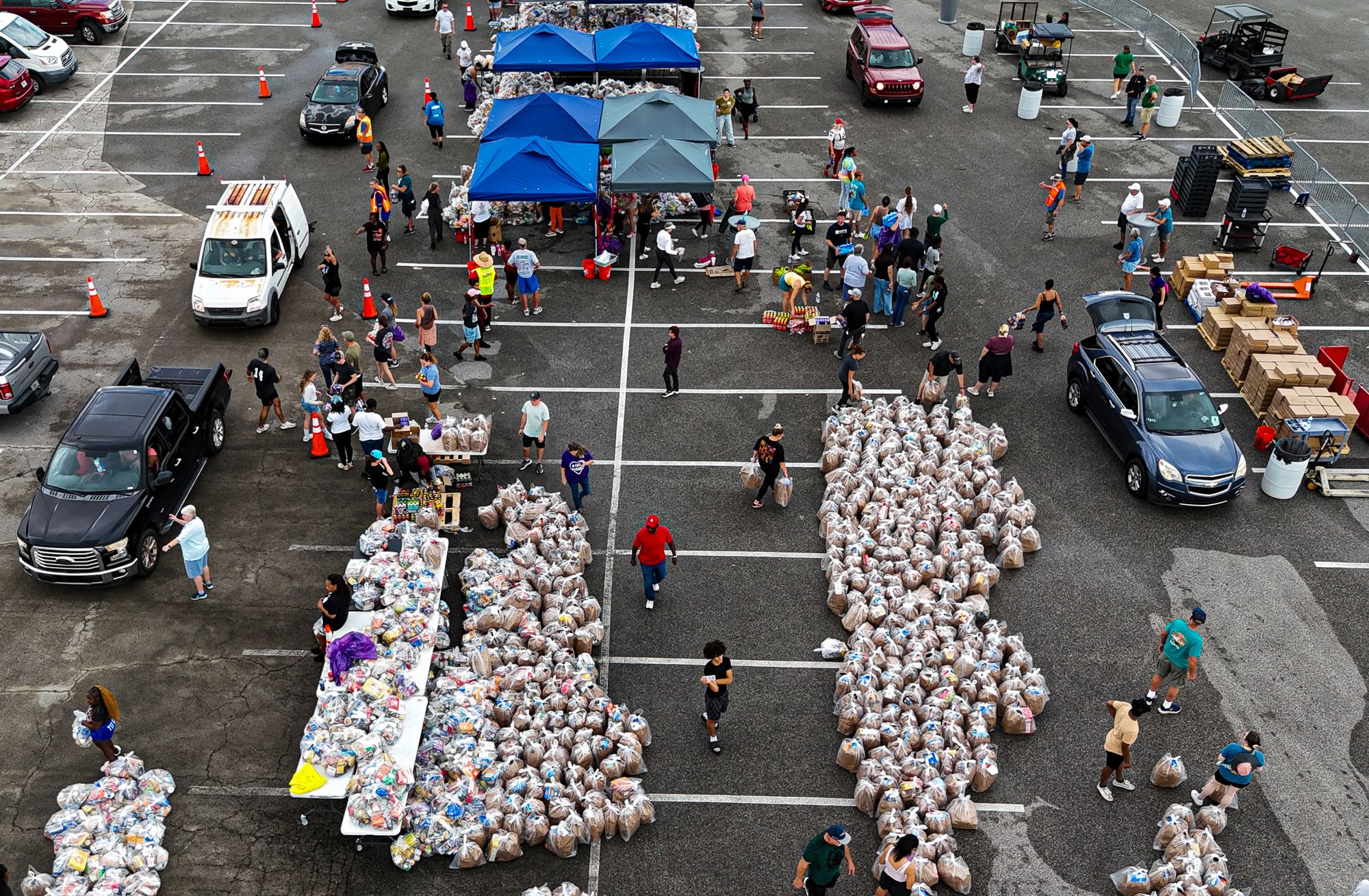 Residents in Daytona Beach, Florida, lineup for food for those impacted by the SNAP benefit cuts. Over 42 million Americans receive assistance through the program.