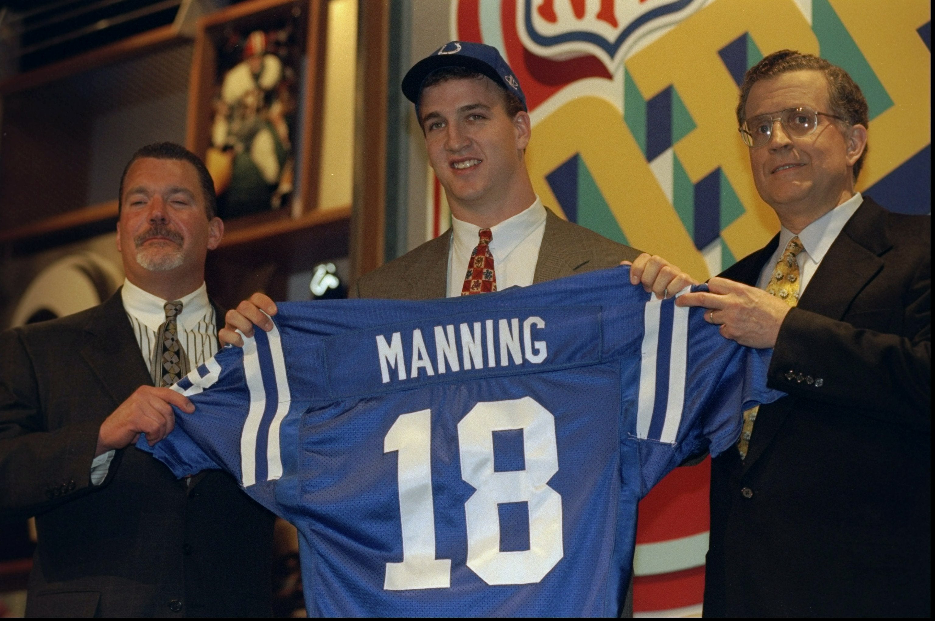 Paul Tagliabue with quarterback Peyton Manning and Indianapolis Colts owner Jim Irsay during the NFL draft at Madison Square Garden in New York in 1998