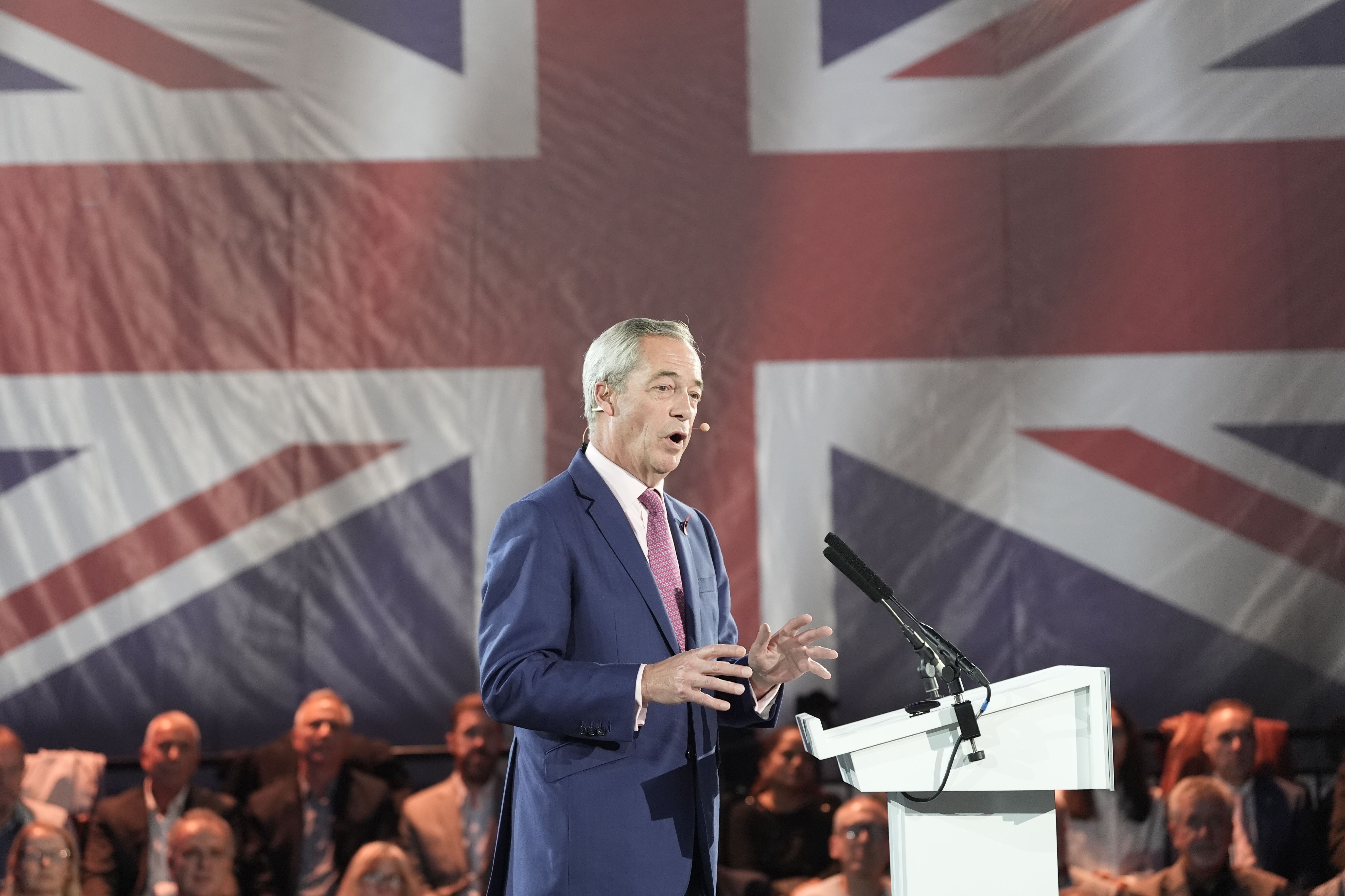 Reform UK leader Nigel Farage speaking during the press conference (Stefan Rousseau/PA)