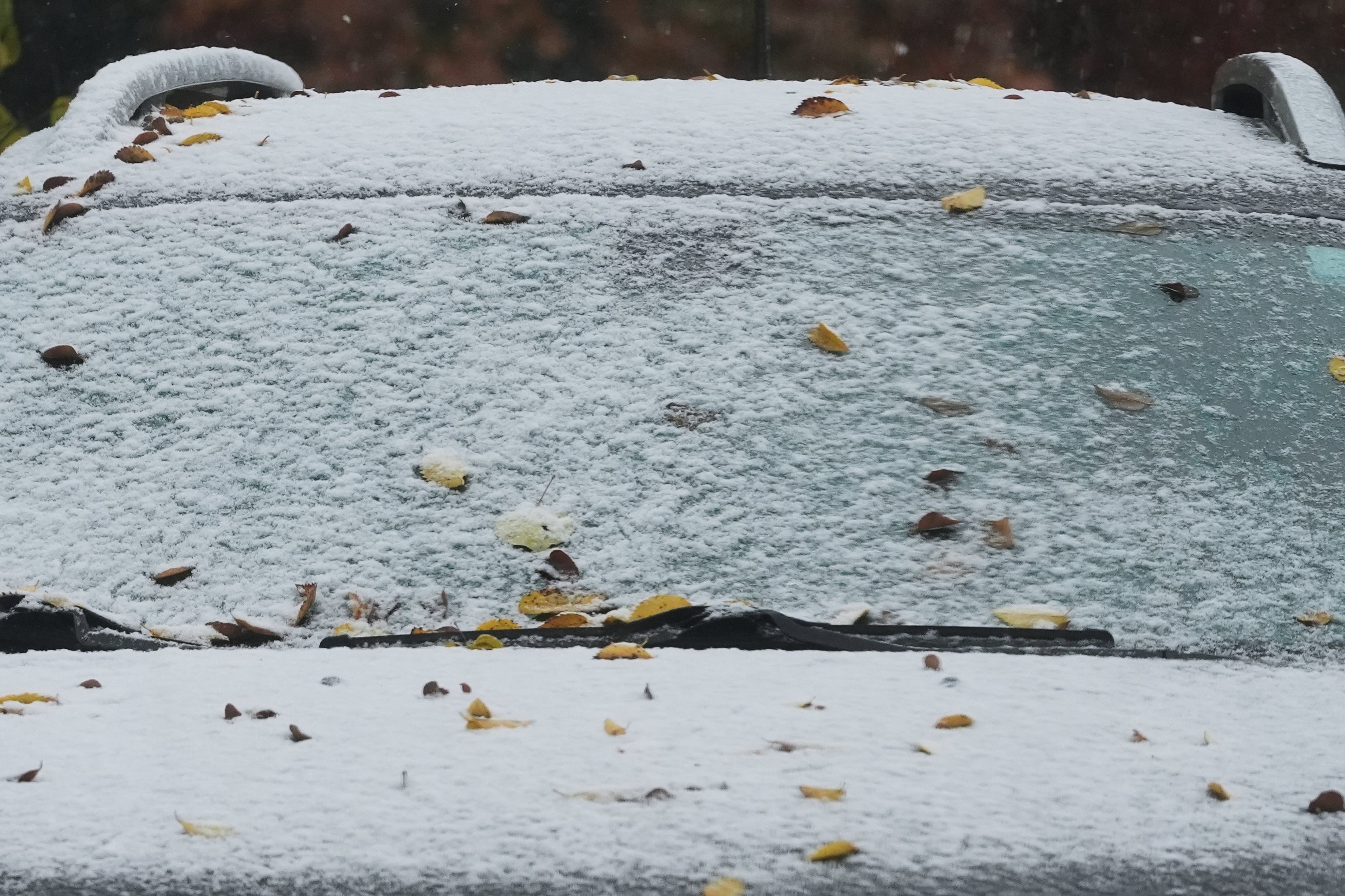 <p>A car is covered with snow during a cold day in Evanston, Ill., Sunday, Nov. 9, 2025</p>