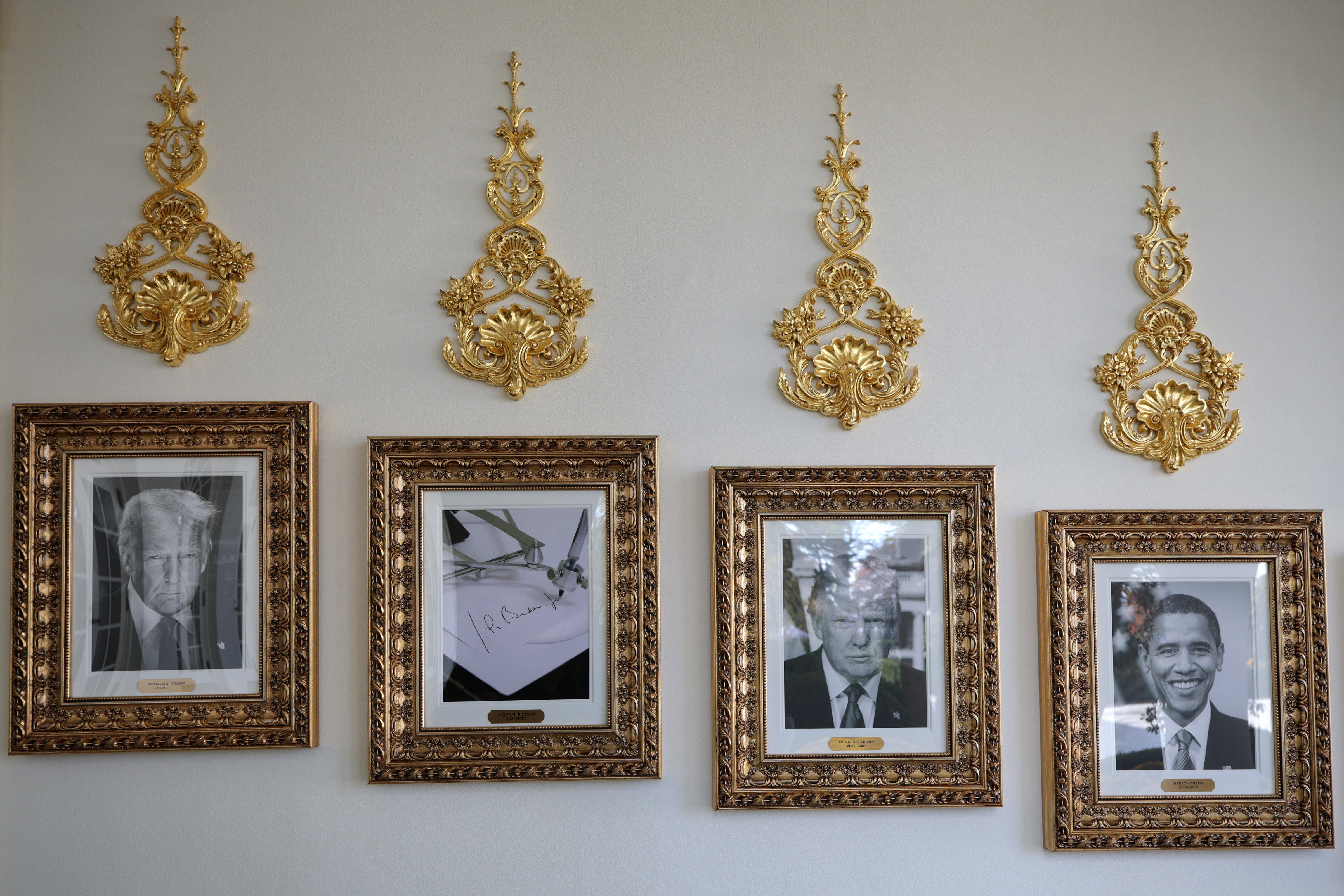 Images of all the presidents, along with gold decorative pieces line the walk