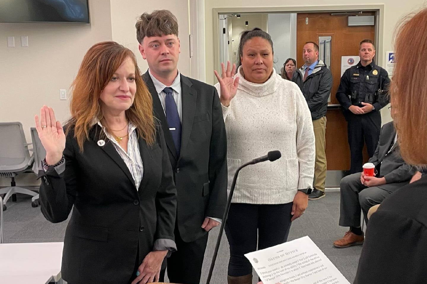 Angela Walker (right) being sworn in