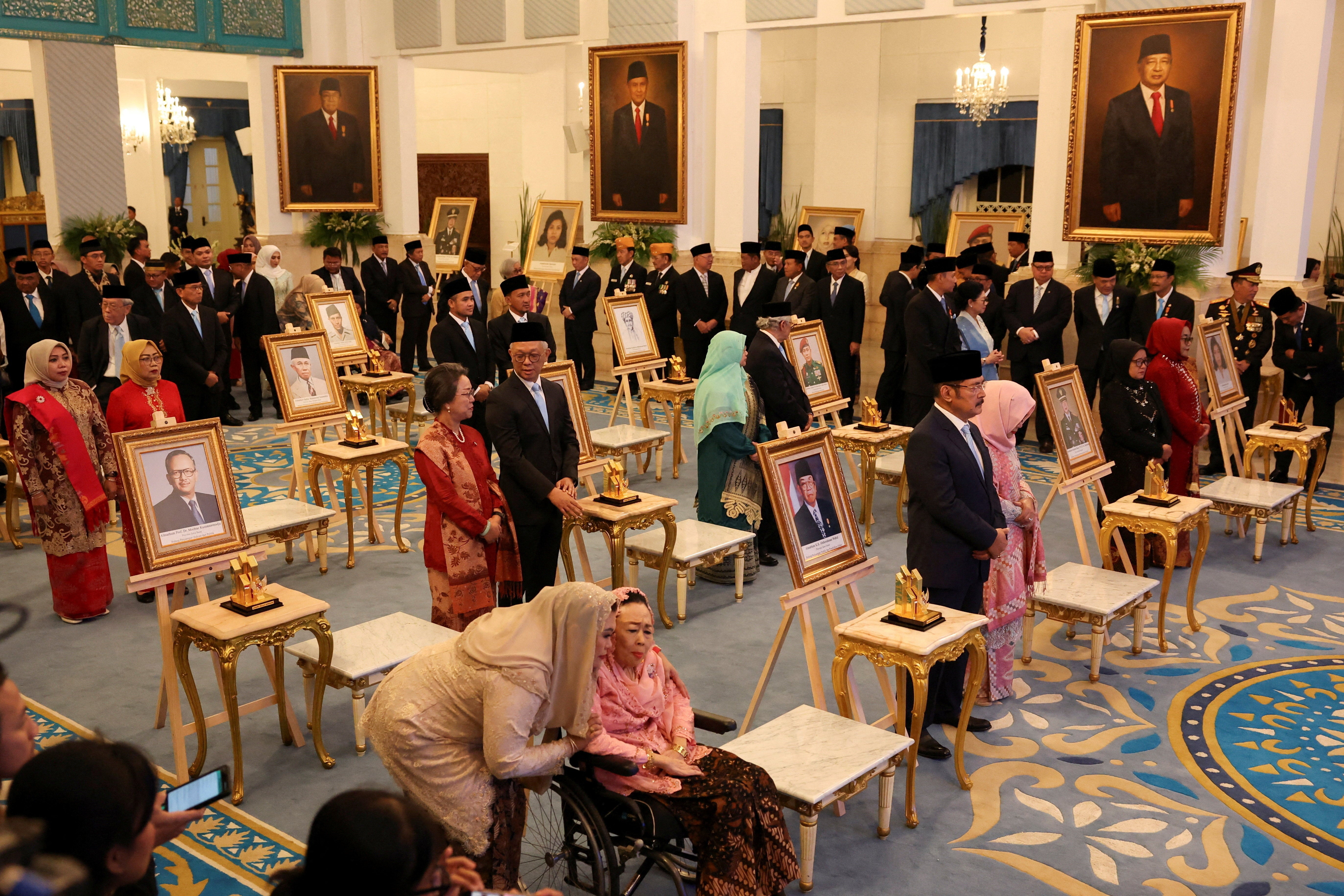 People attend the National Hero award ceremony at the State Palace in Jakarta, Indonesia, on 10 November 2025