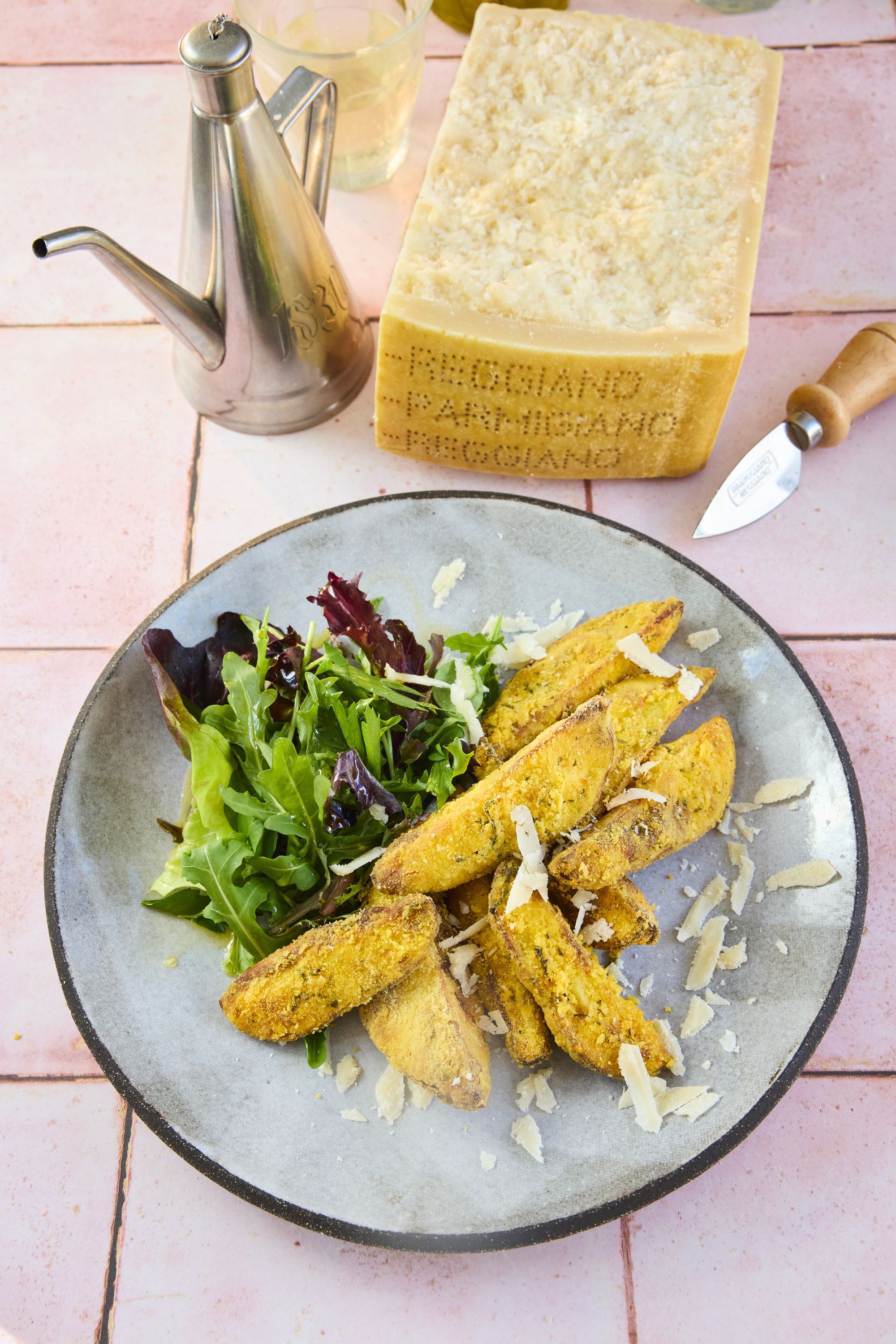 Proof that even the humblest spud can taste luxurious when showered with herbs, polenta and plenty of cheese