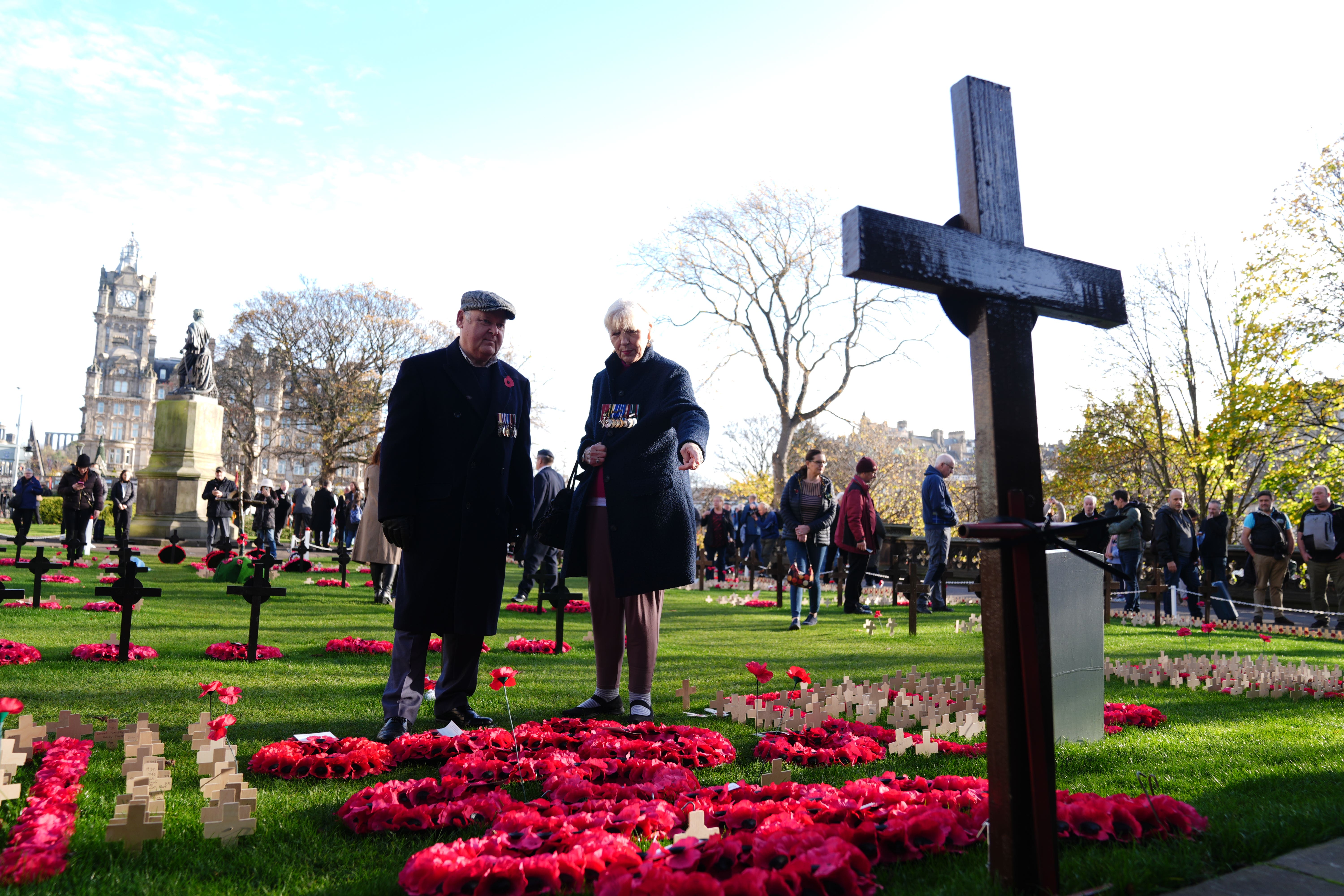 People look at wreaths following a ceremony to mark Armistice Day in 2024. (Andrew Milligan/PA)