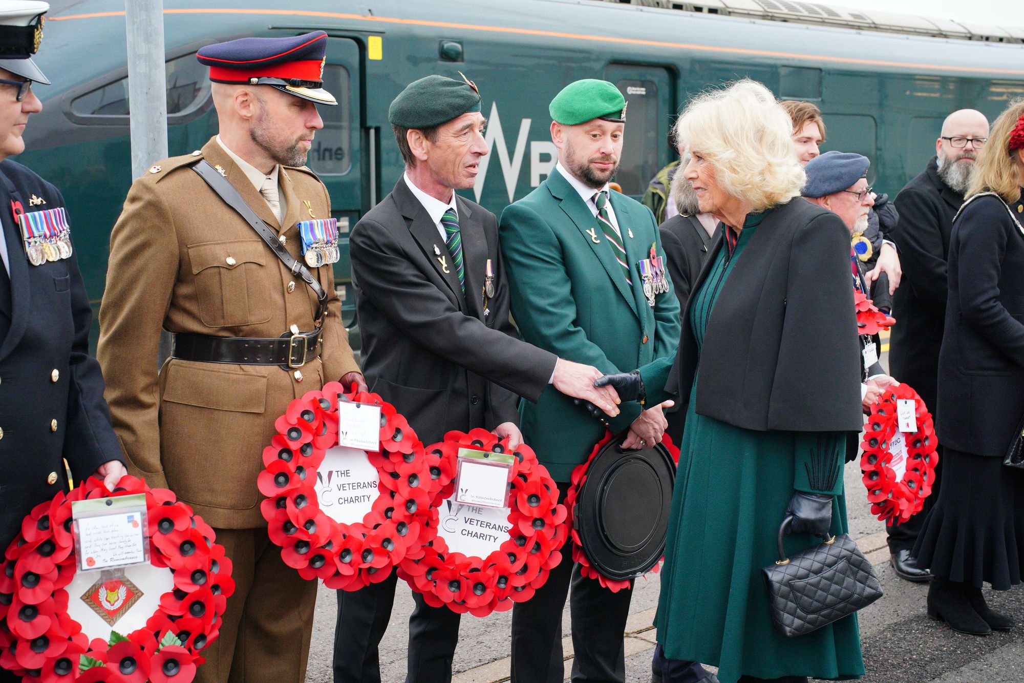 Camilla placed a wreath of poppies at the war memorial at Platform One at Paddington before the Last Post was sounded to mark the start of the two minutes’ silence