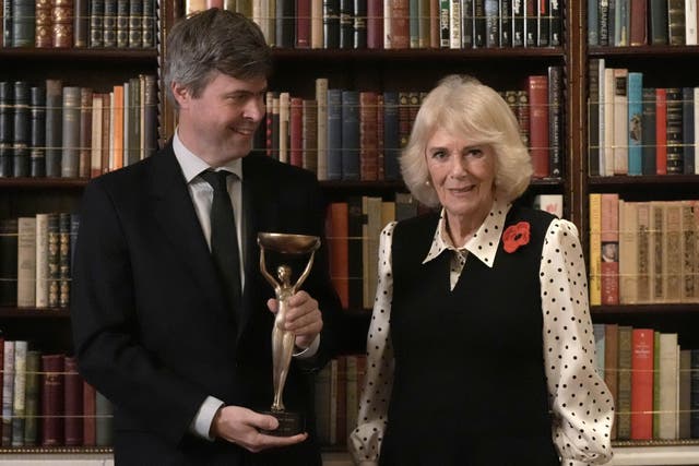 <p>Queen Camilla with 2025 Booker prize winner David Szalay during a reception for shortlisted authors, judges and supporters</p>